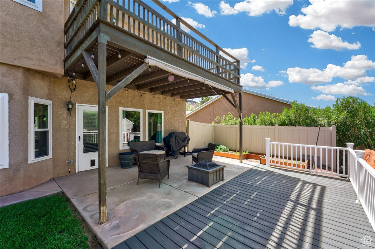 Deck featuring a patio area, an outdoor hangout area, and grilling area