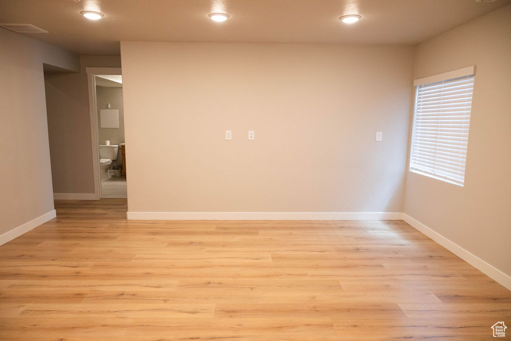 Family room with light laminate flooring
