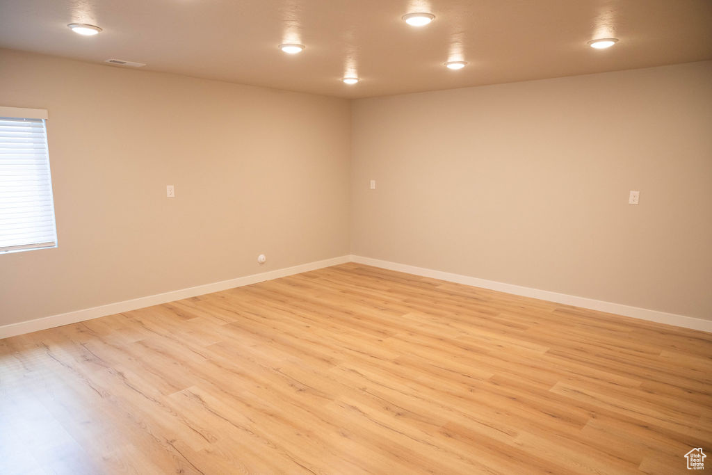 Family room with light laminate flooring