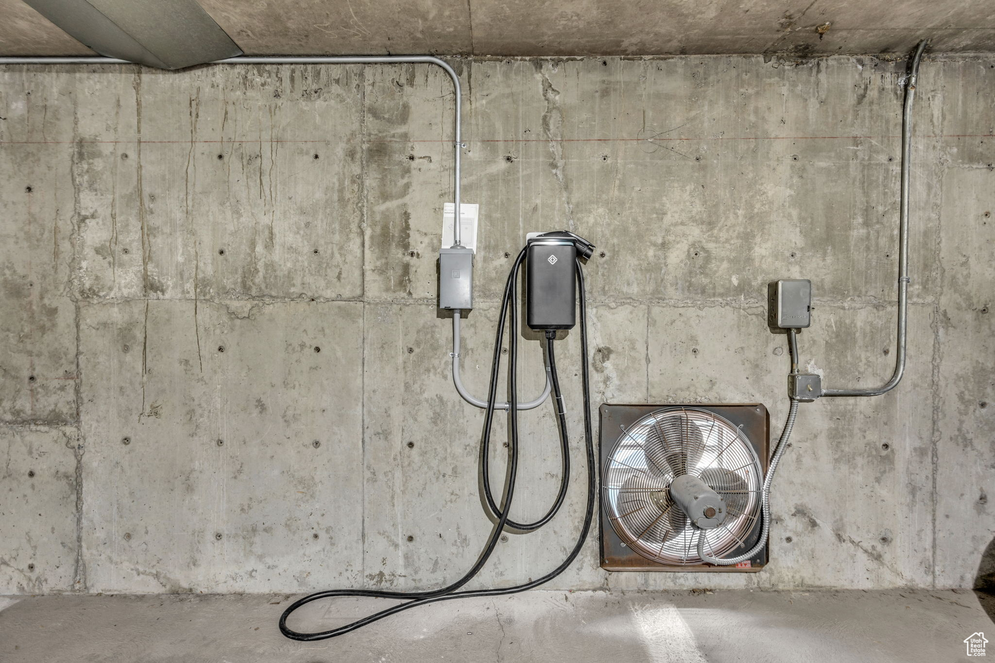 View of your private Electric Vehicle charger (50 amp) in front of your 2 deeded parking stalls