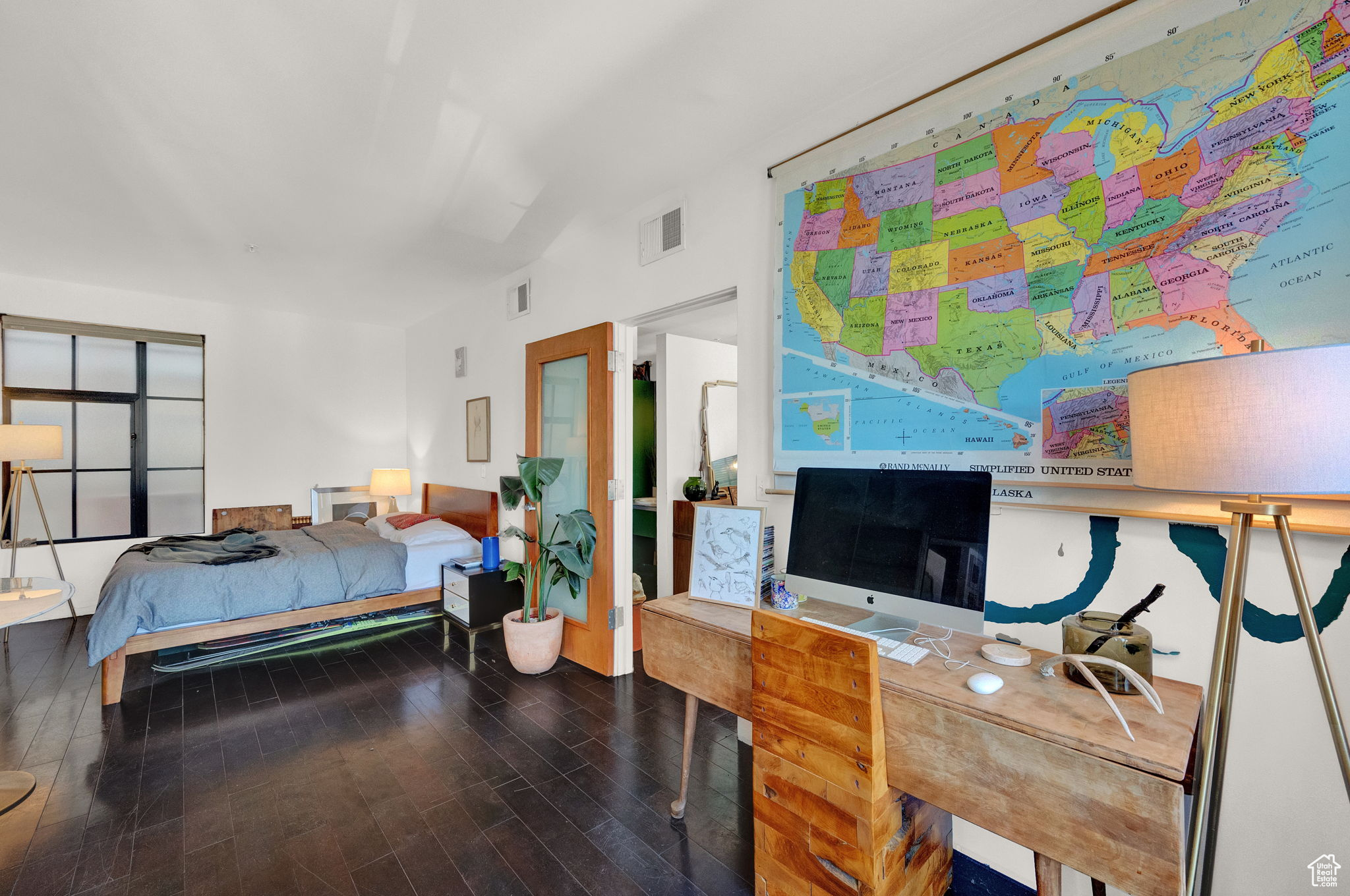 Bedroom featuring wood-type flooring