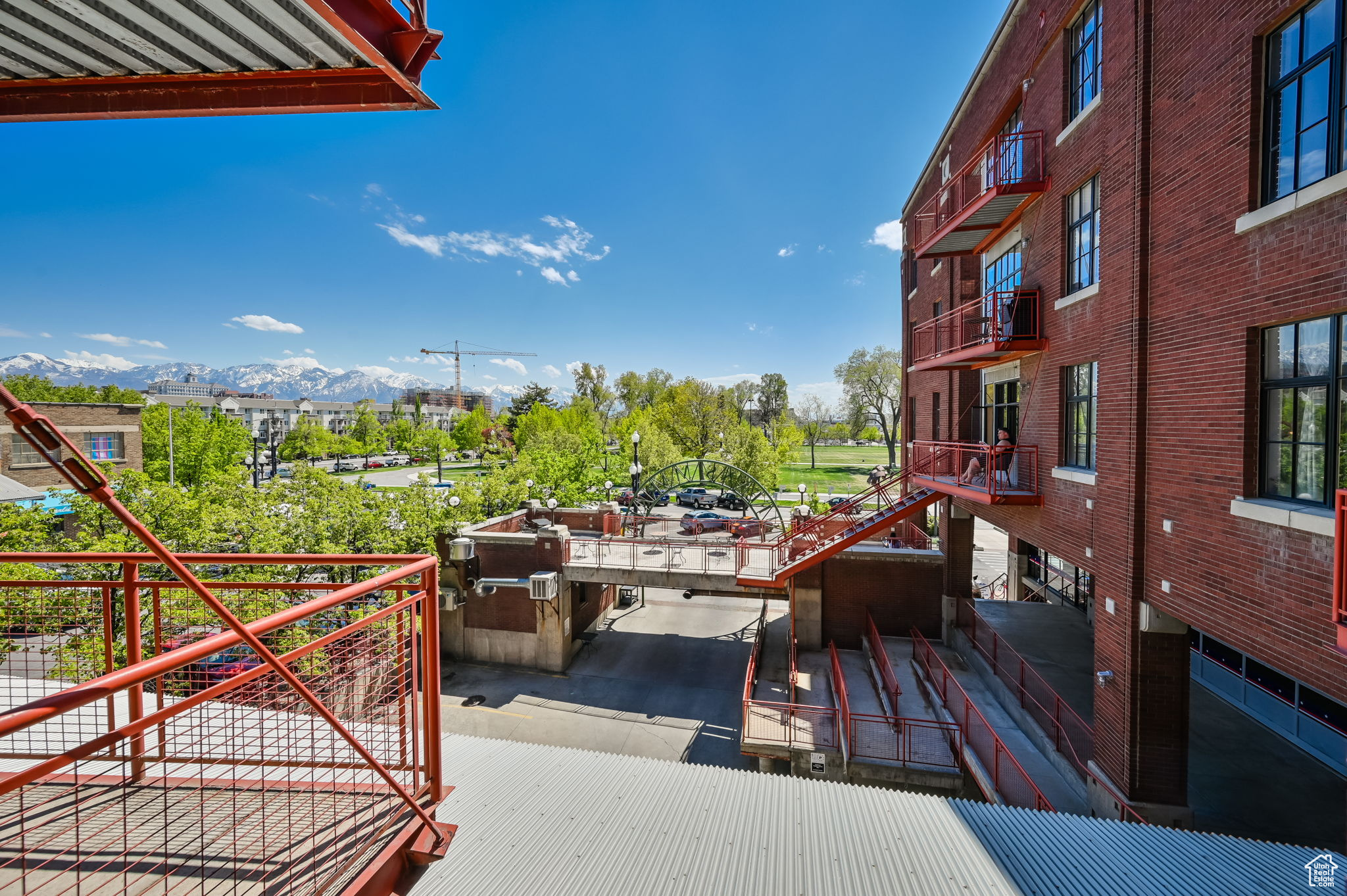 View of patio featuring a mountain view and a balcony