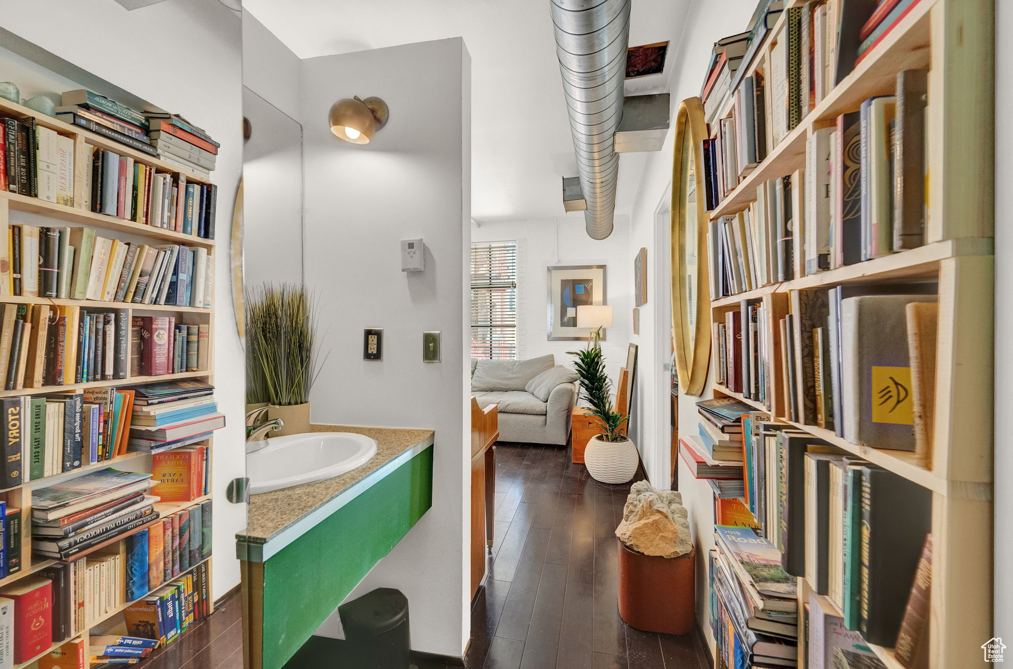 Bathroom with wood-type flooring and vanity