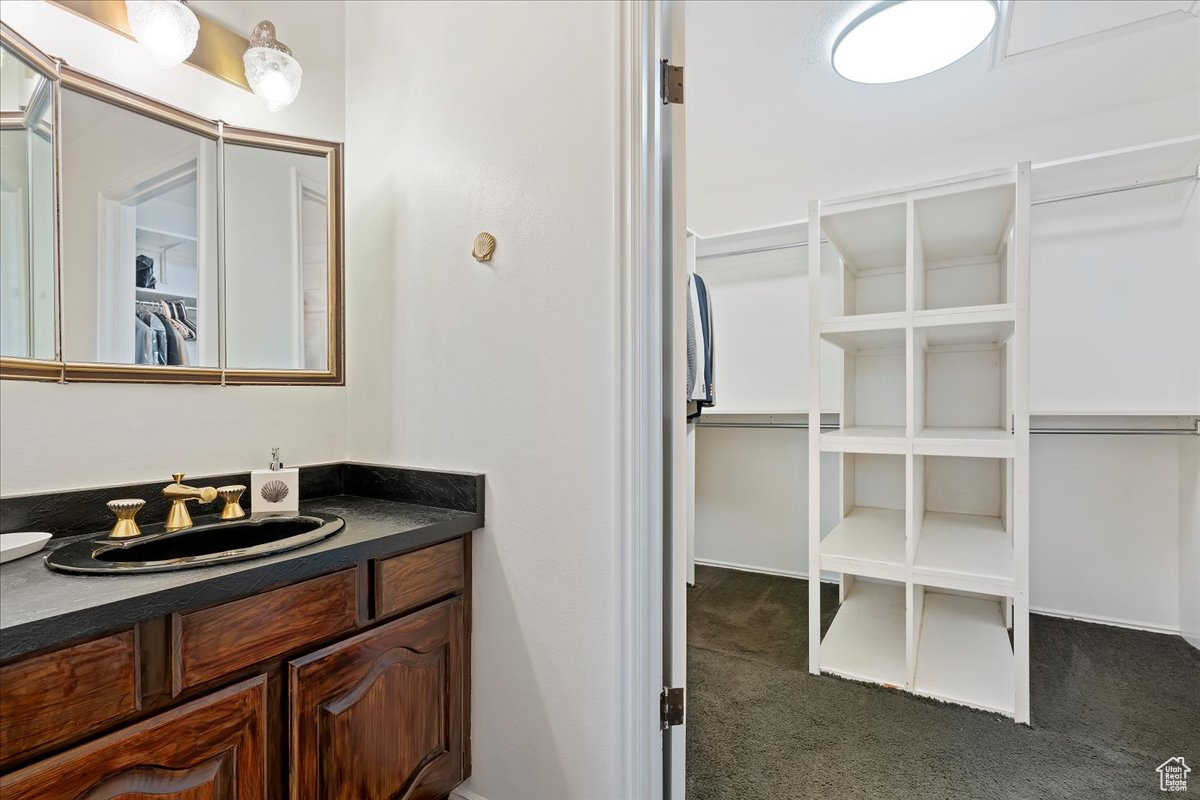 Primary bathroom with large walk in closet