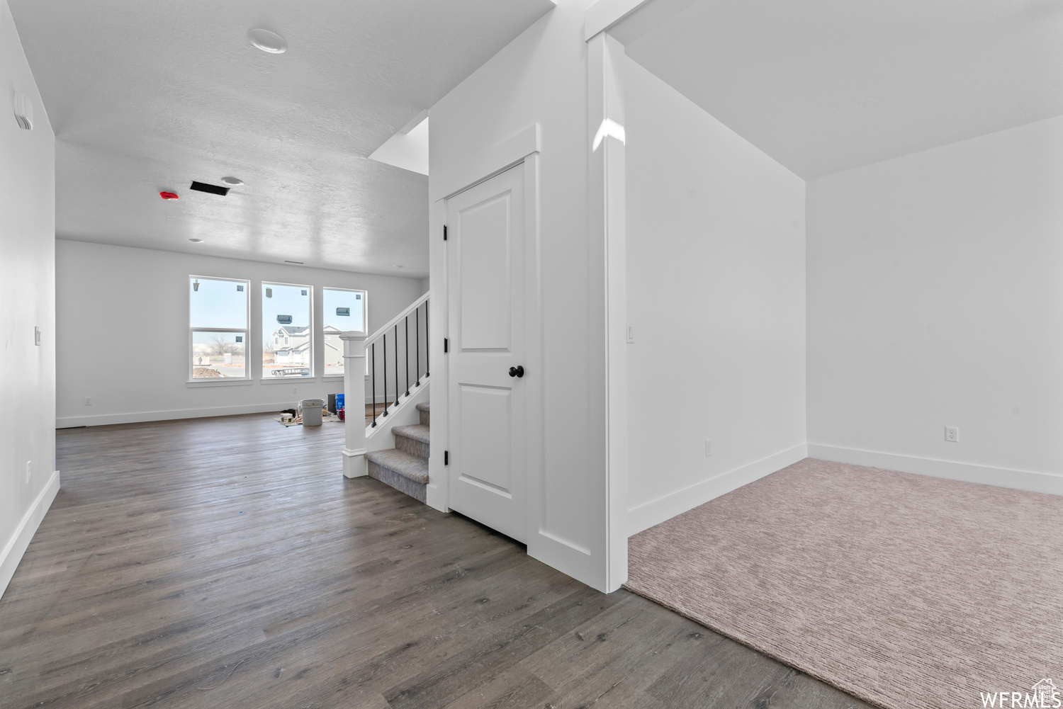Unfurnished room featuring hardwood / wood-style floors