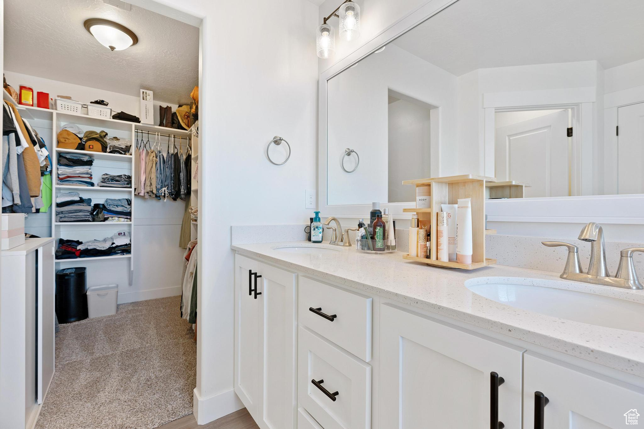 Bathroom featuring dual vanity