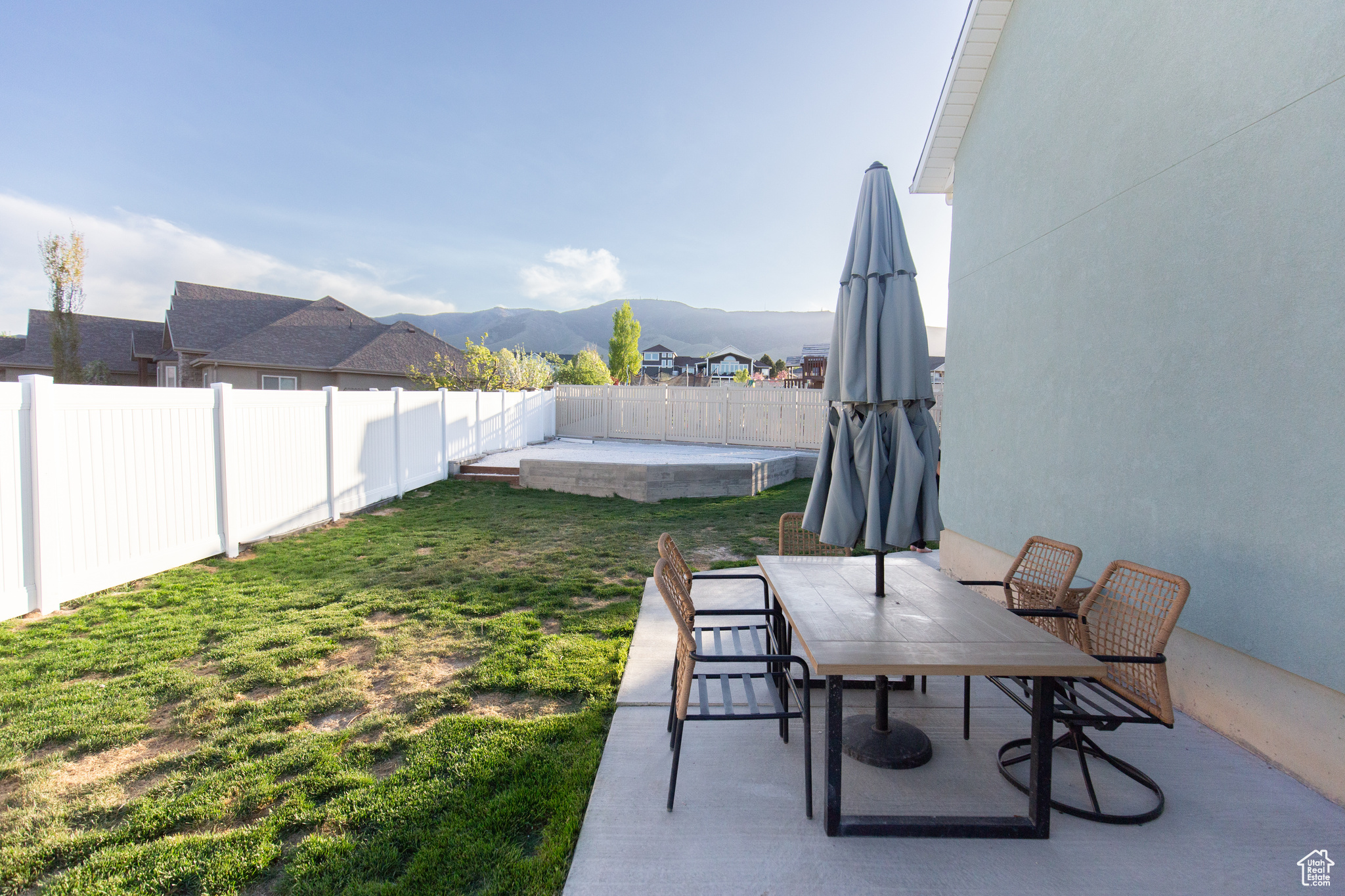 View of yard with a mountain view and a patio