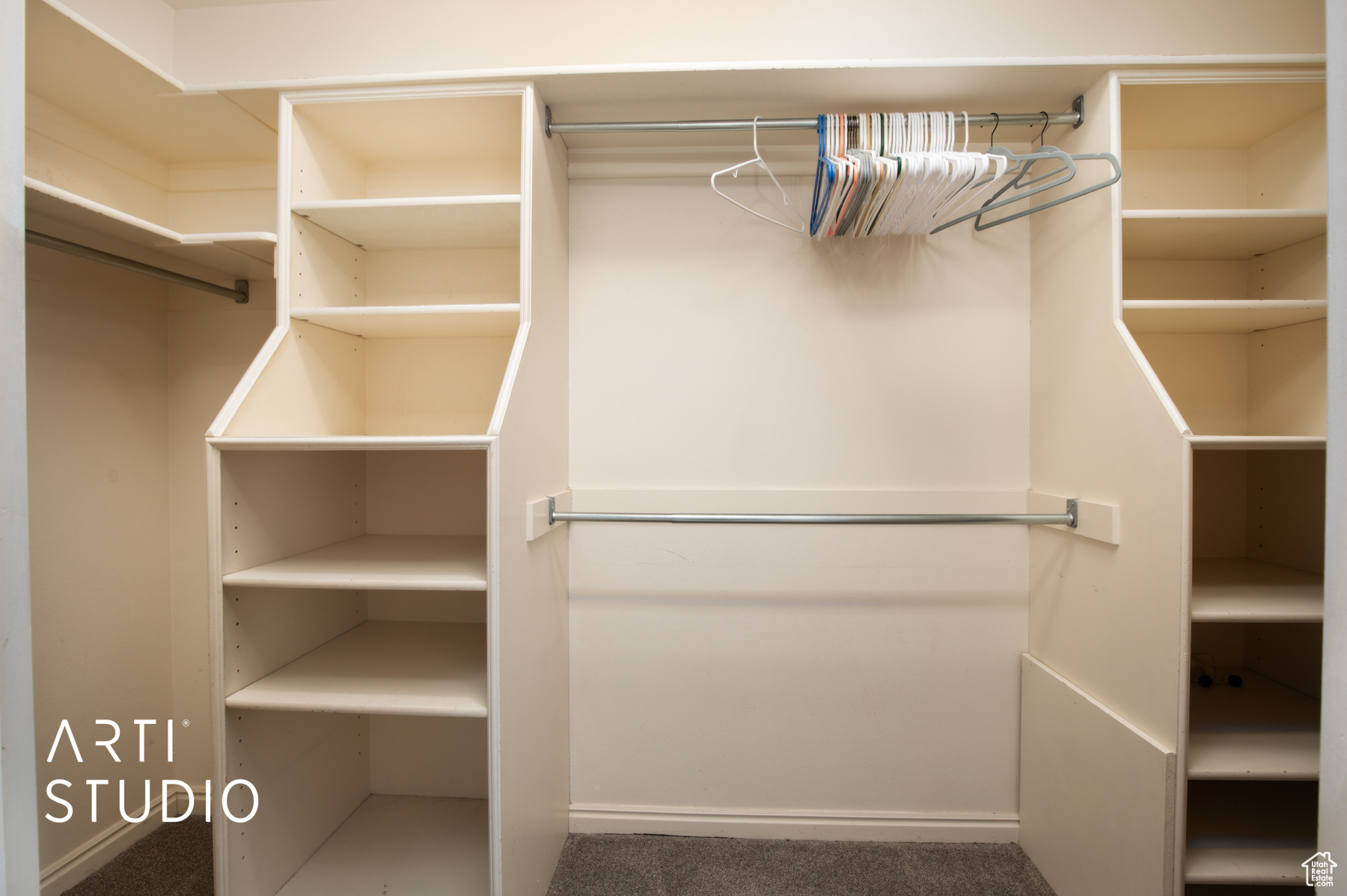 Walk in closet featuring built-in shleving