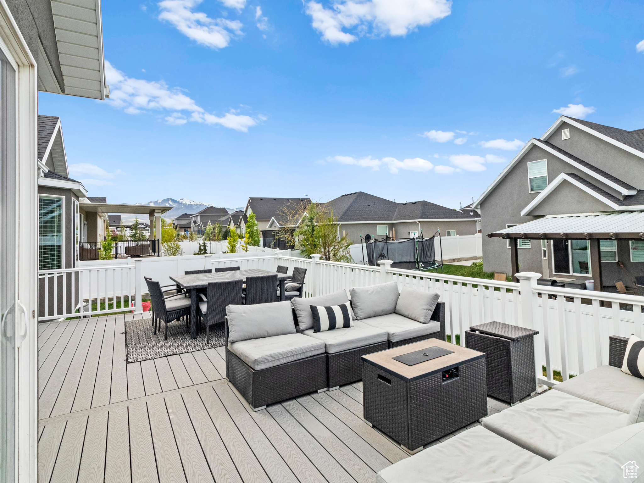 Deck with an outdoor living space