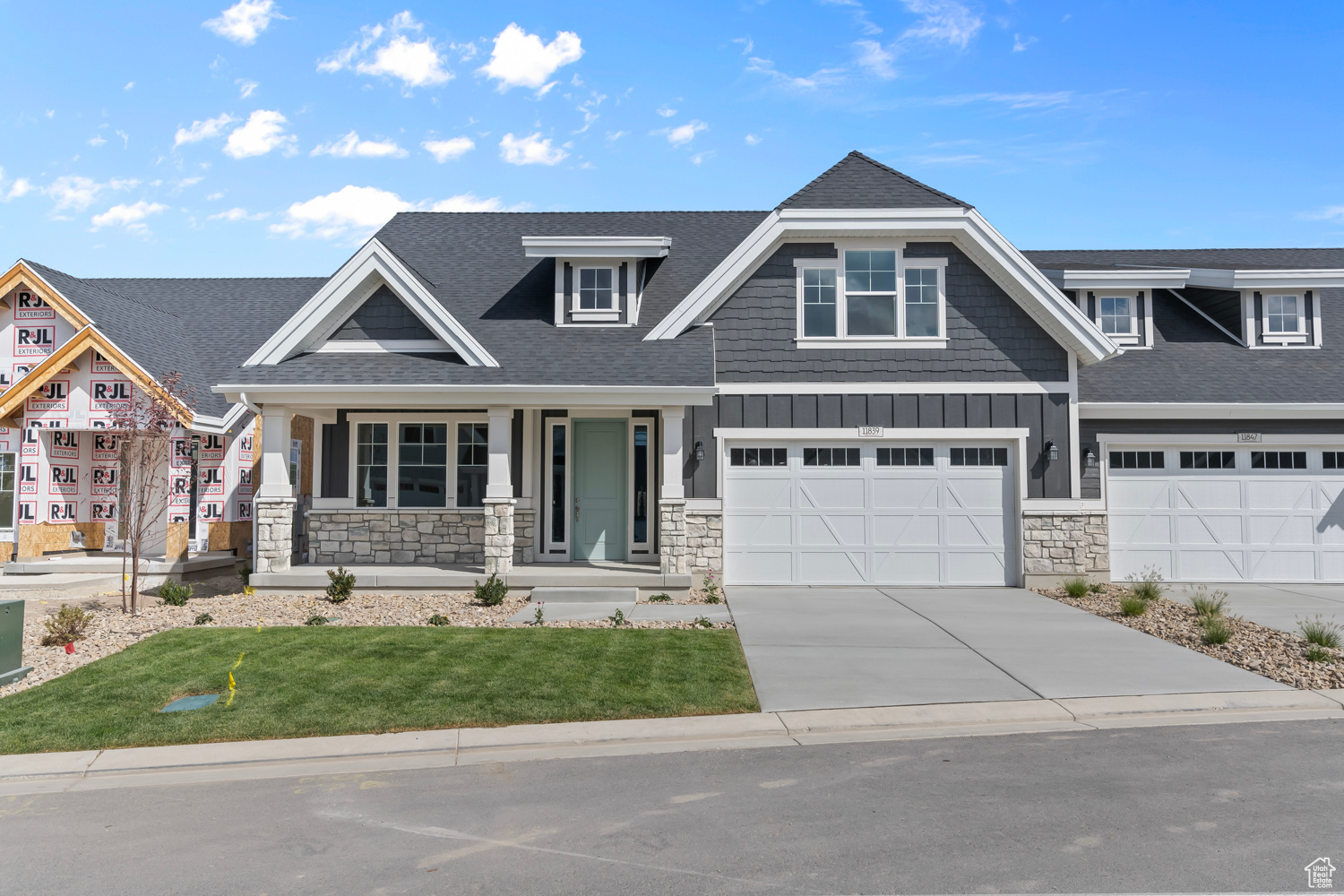 Craftsman-style house featuring a garage and covered porch