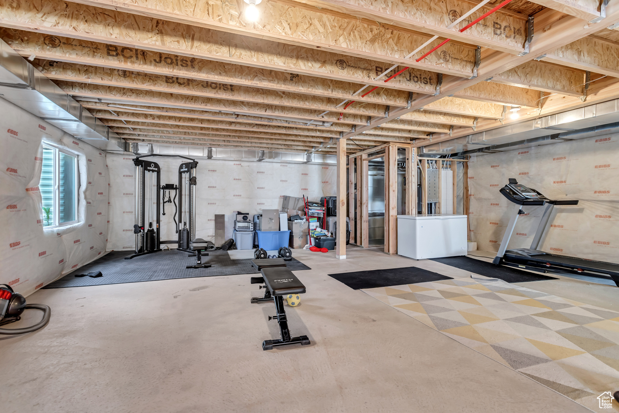 Workout area featuring concrete flooring