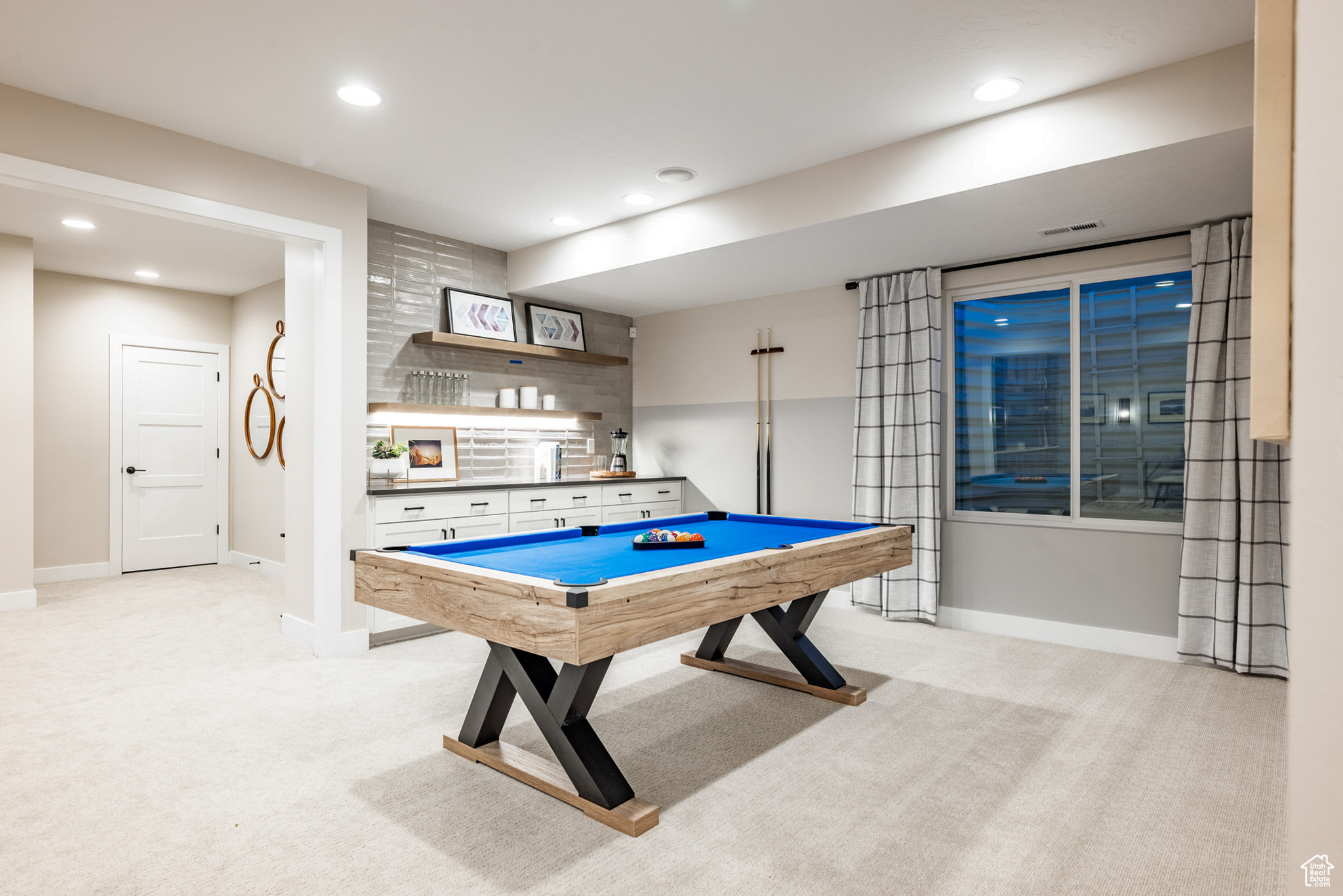 Playroom featuring pool table and light carpet