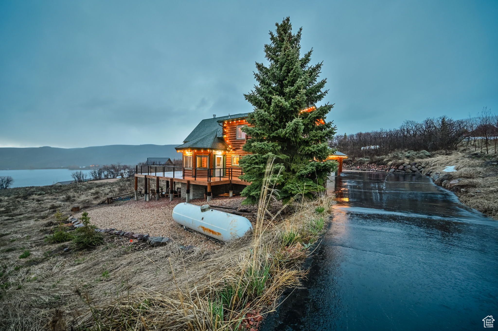 Exterior space with a deck with water view