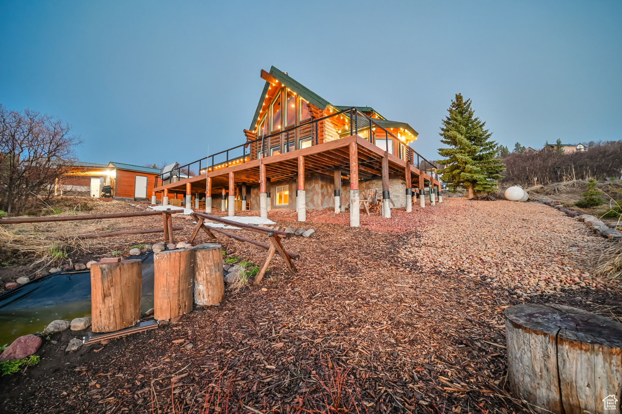 Rear view of house with a deck