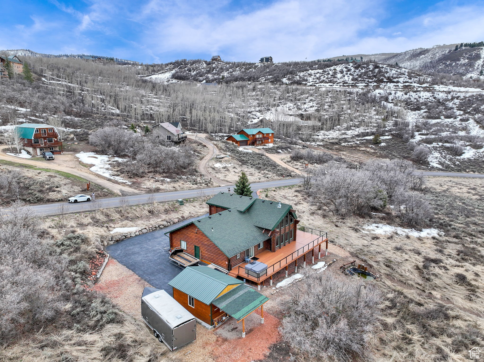 Snowy aerial view featuring a mountain view