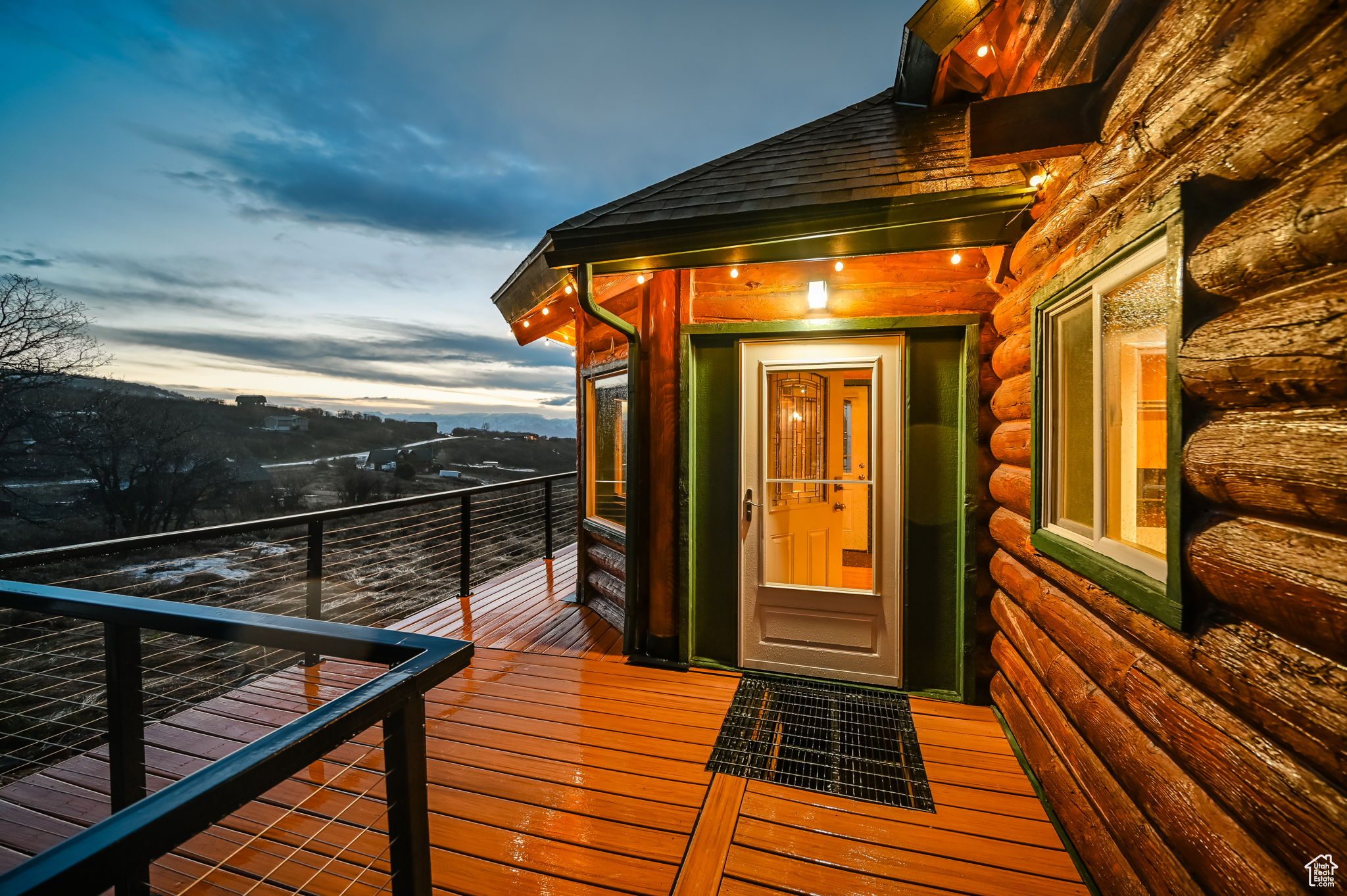 View of deck at dusk