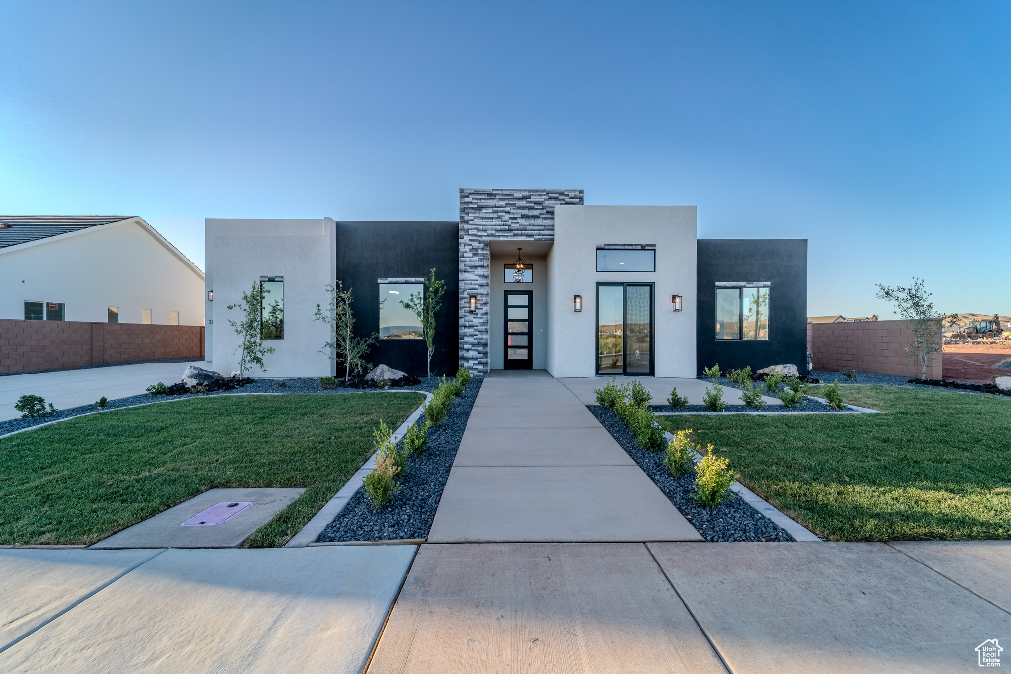 Contemporary home featuring a front yard