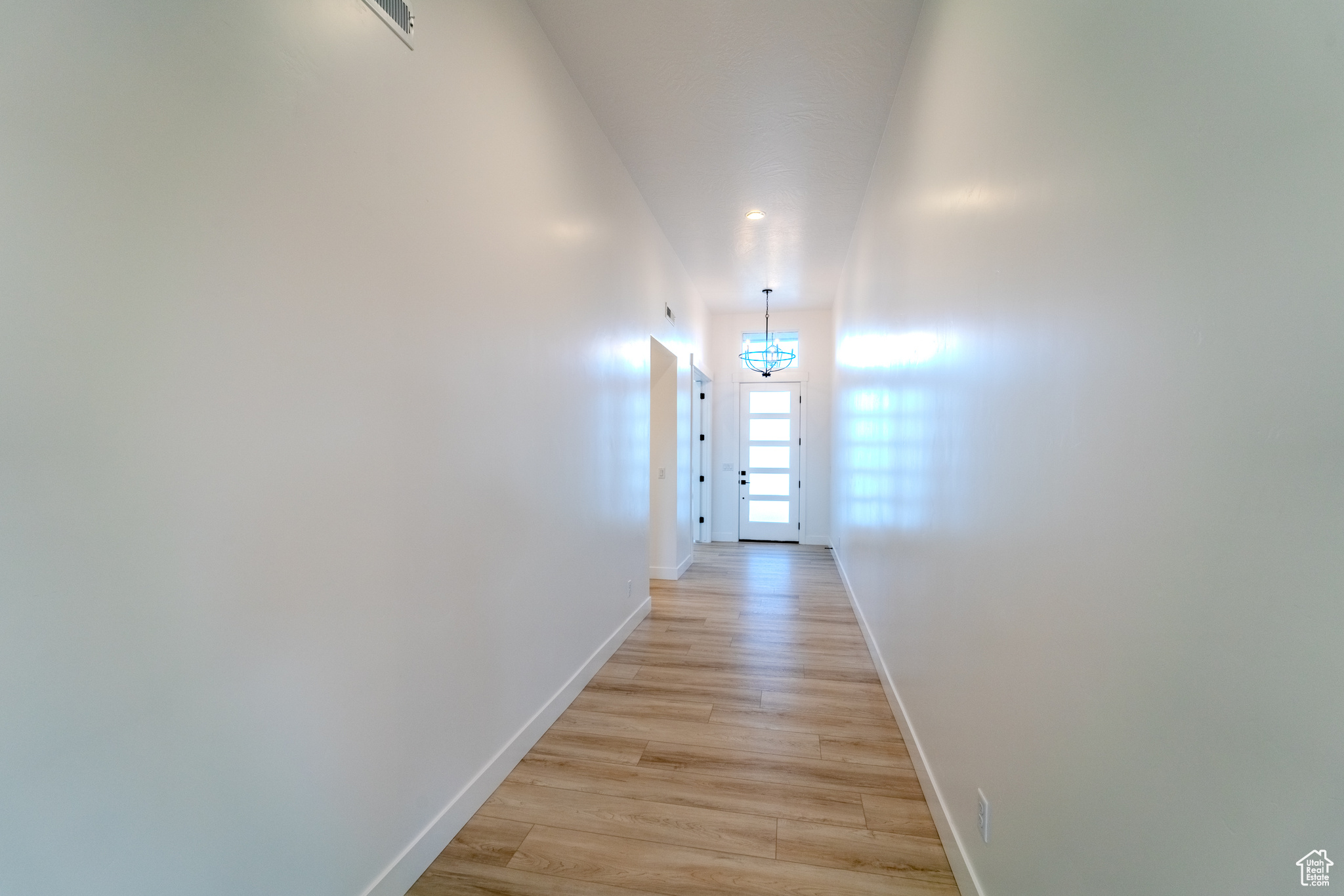 Hall featuring light hardwood / wood-style floors