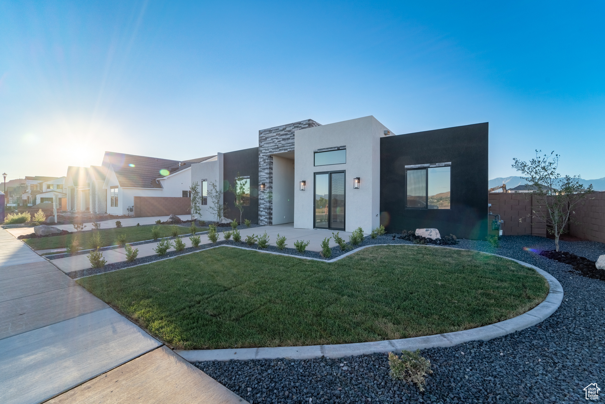 Modern home featuring a front yard