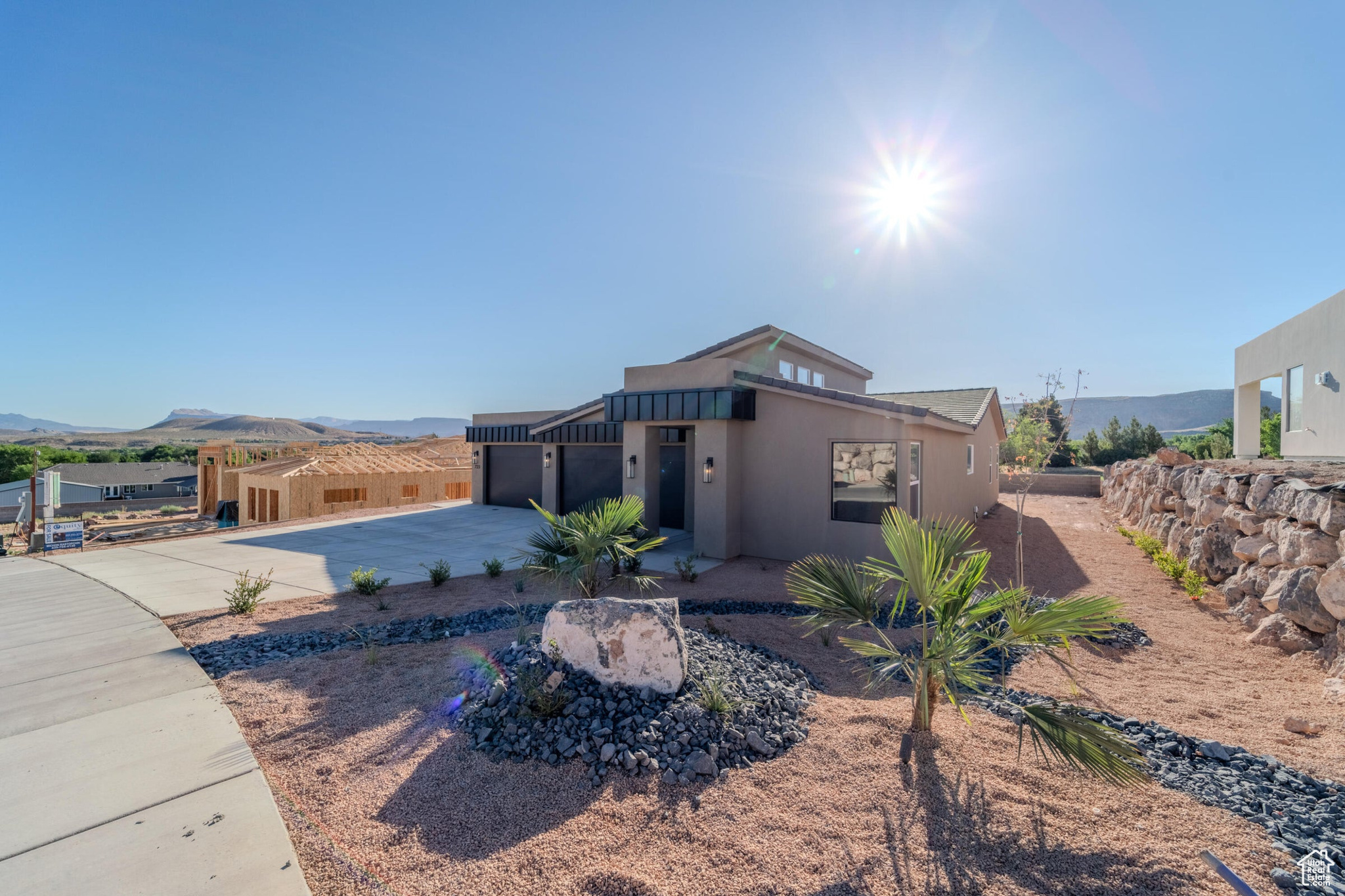 View of front of property featuring a garage