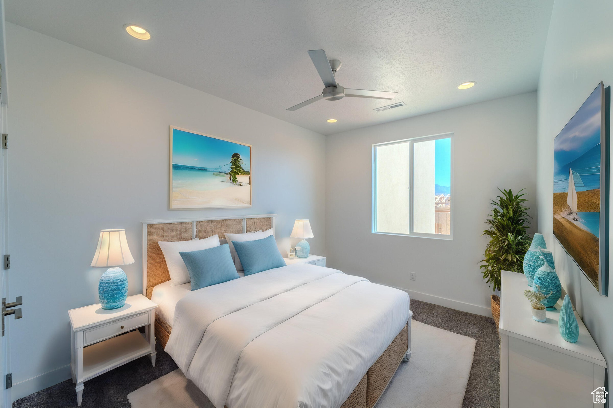 Bedroom with carpet and ceiling fan