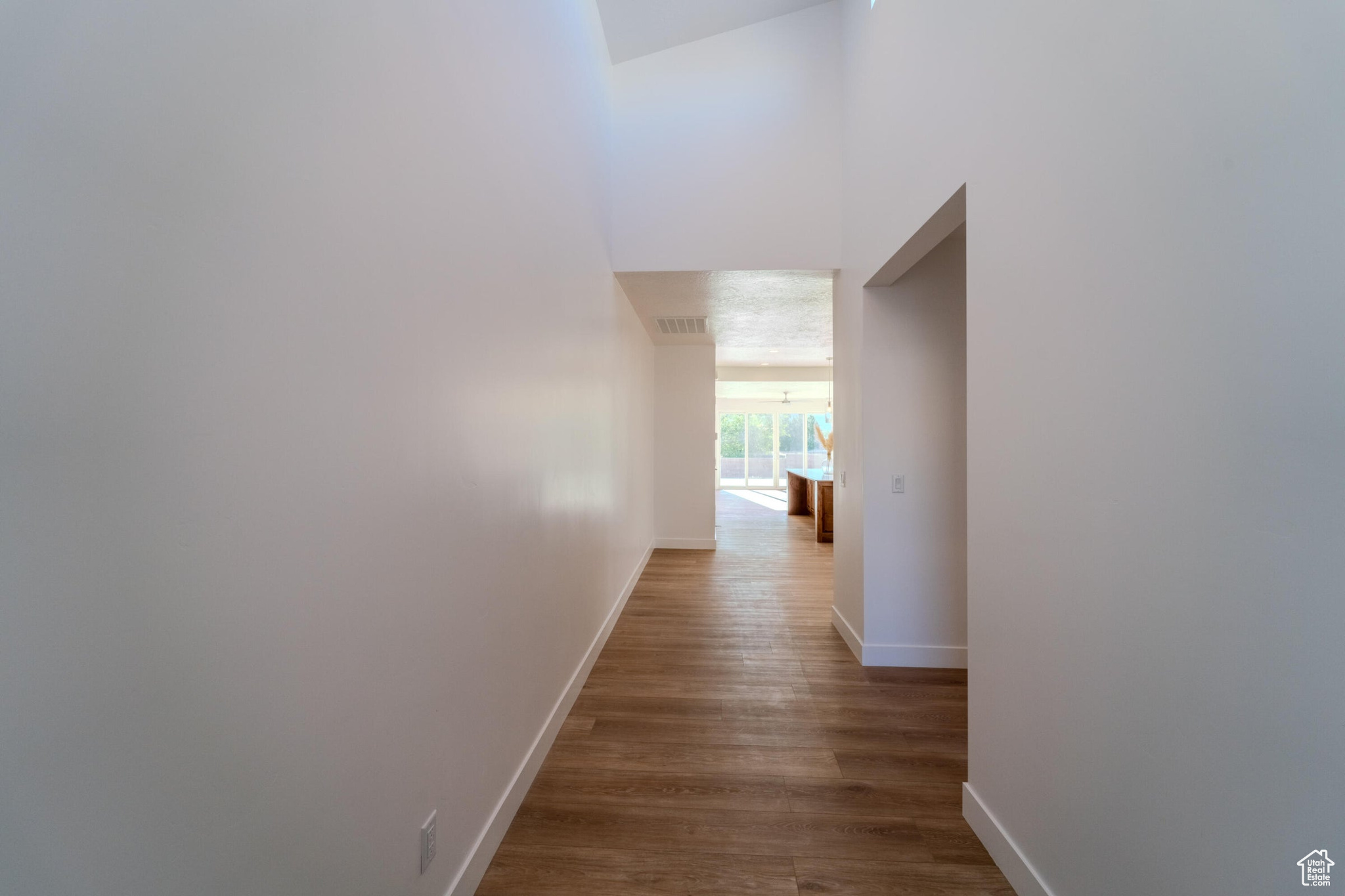 Hallway featuring hardwood / wood-style flooring