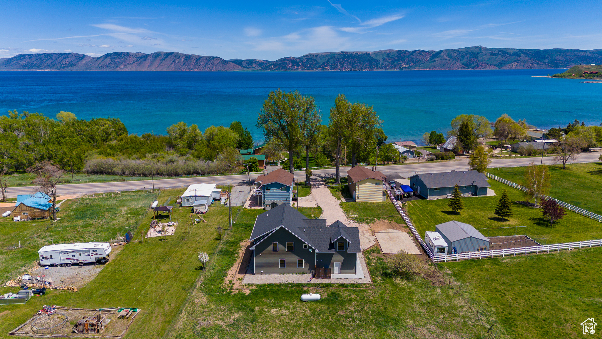 Bird's eye view featuring a water and mountain view