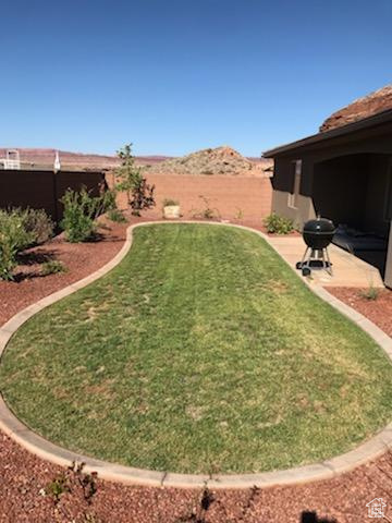 View of yard with a patio