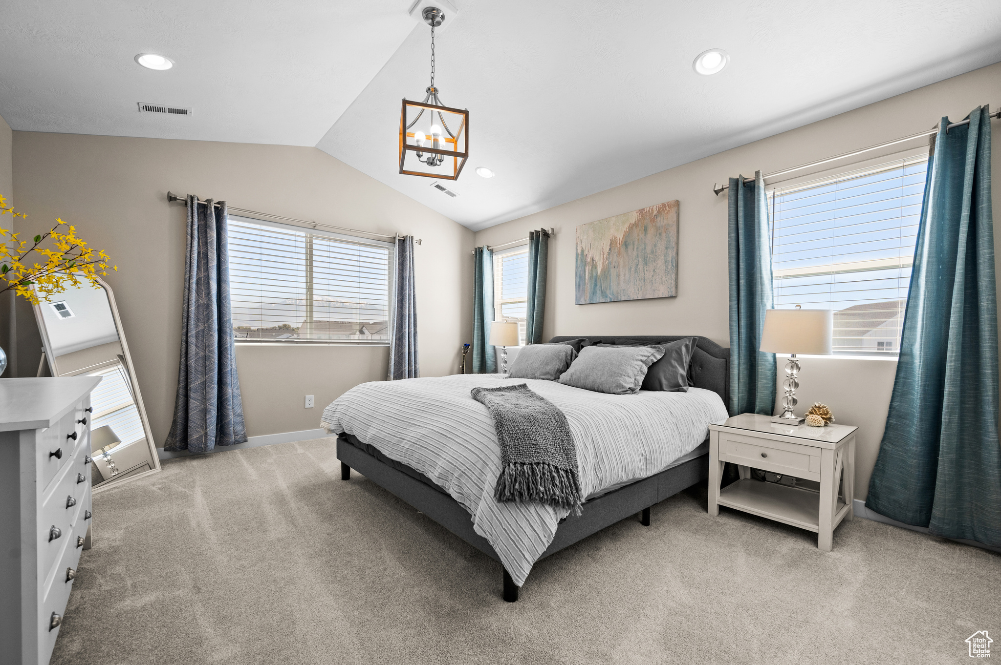 Large master bedroom with large windows for plenty of natural light.