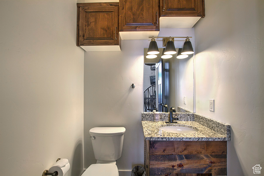 Bathroom with vanity and toilet