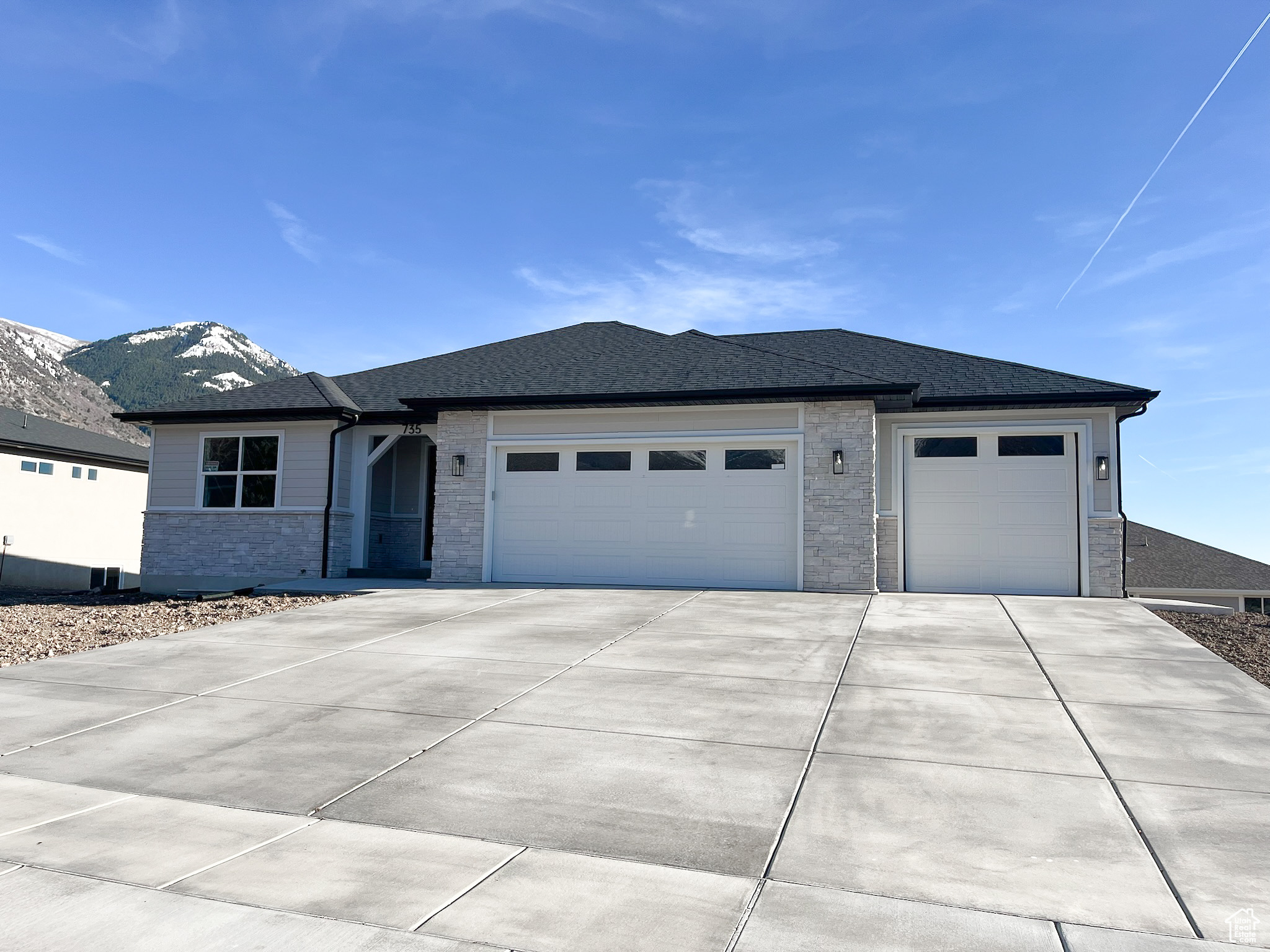 View of front of home with a garage