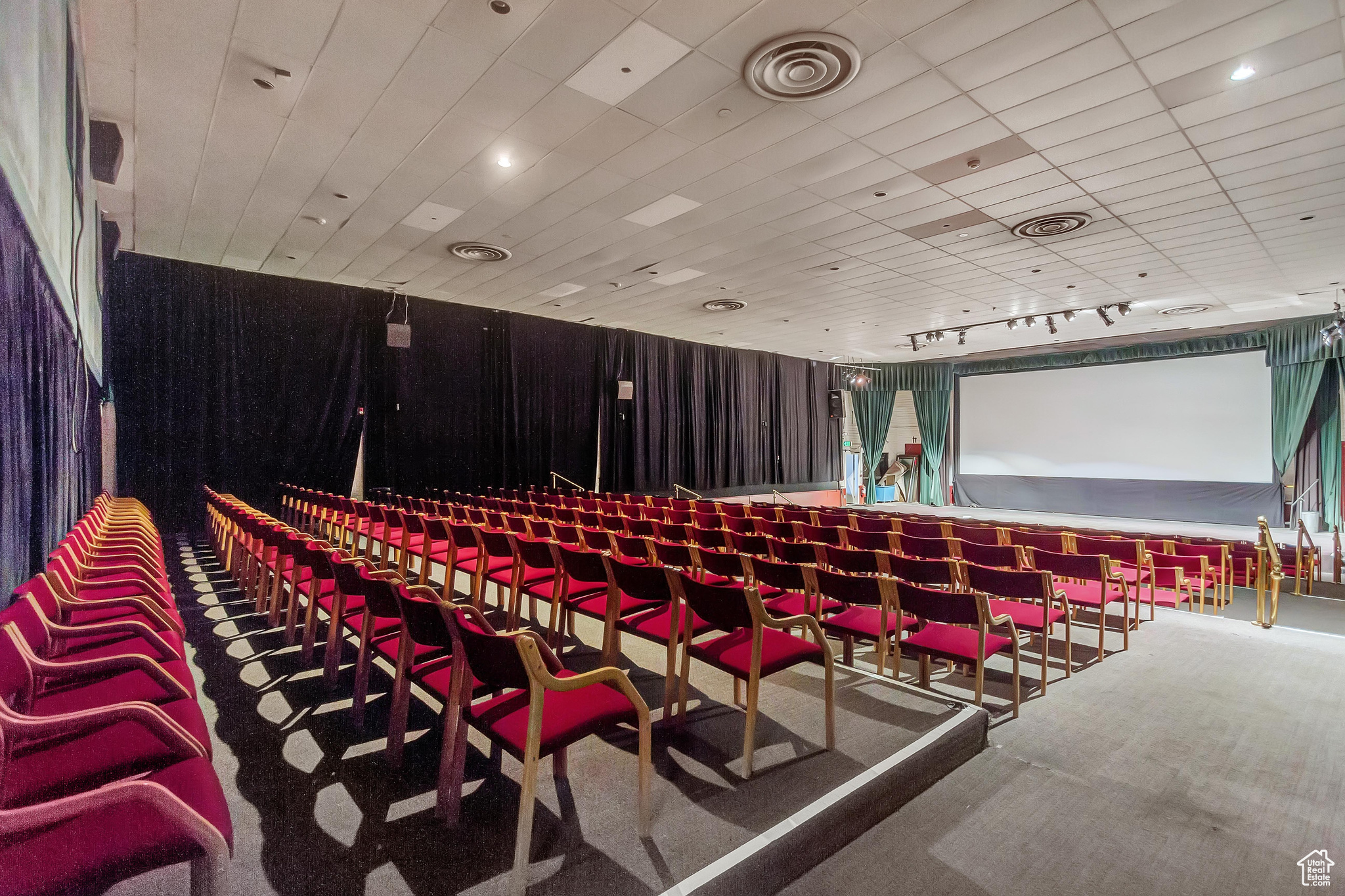 Home theater room featuring carpet