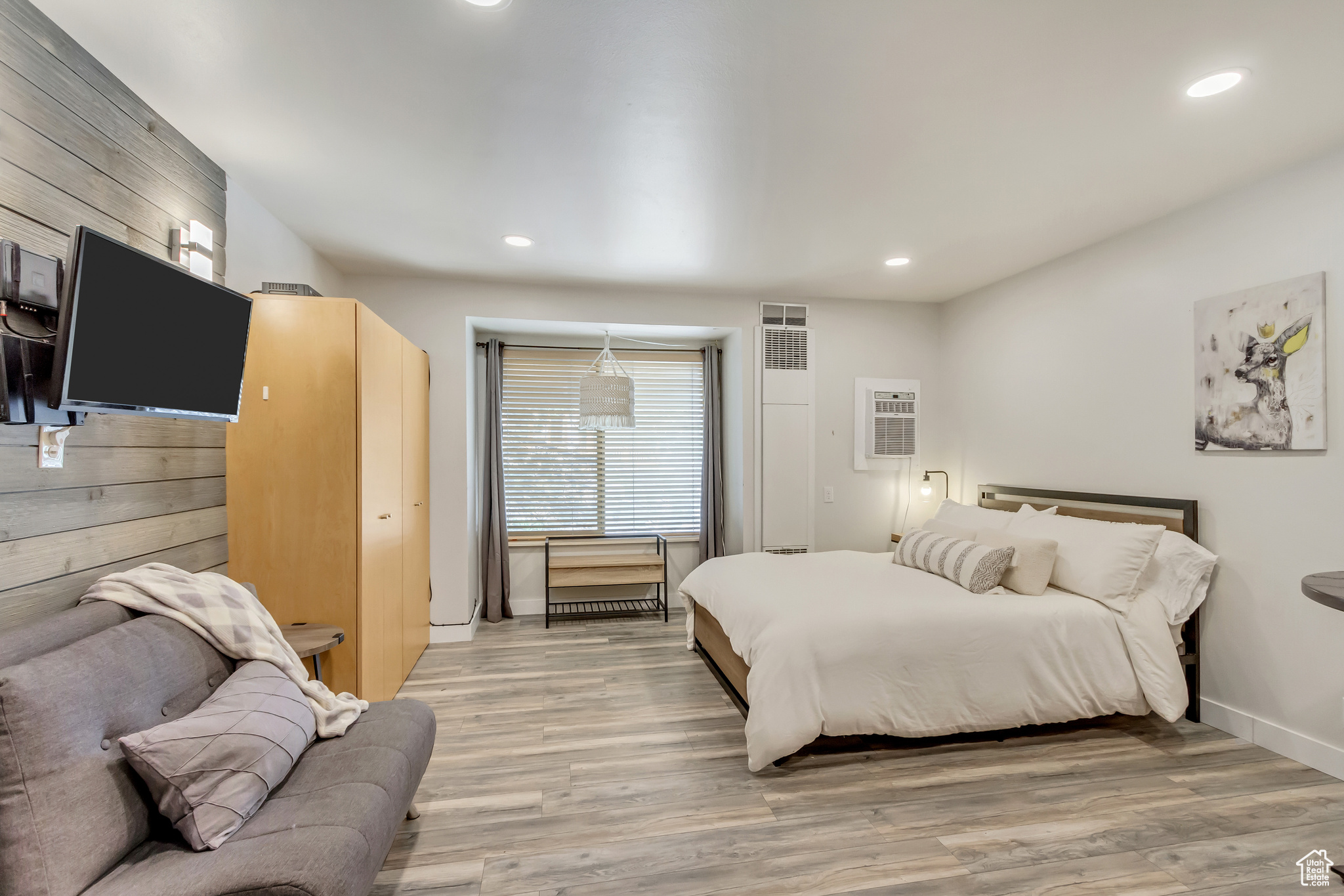 Bedroom featuring hardwood / wood-style flooring