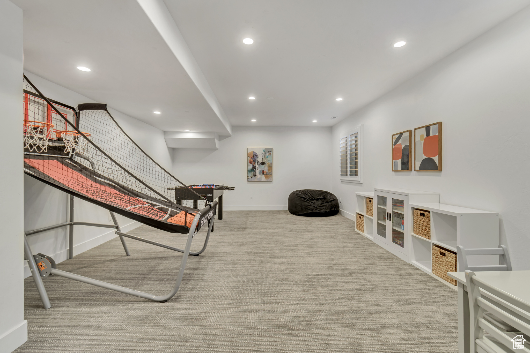 Workout area with light colored carpet