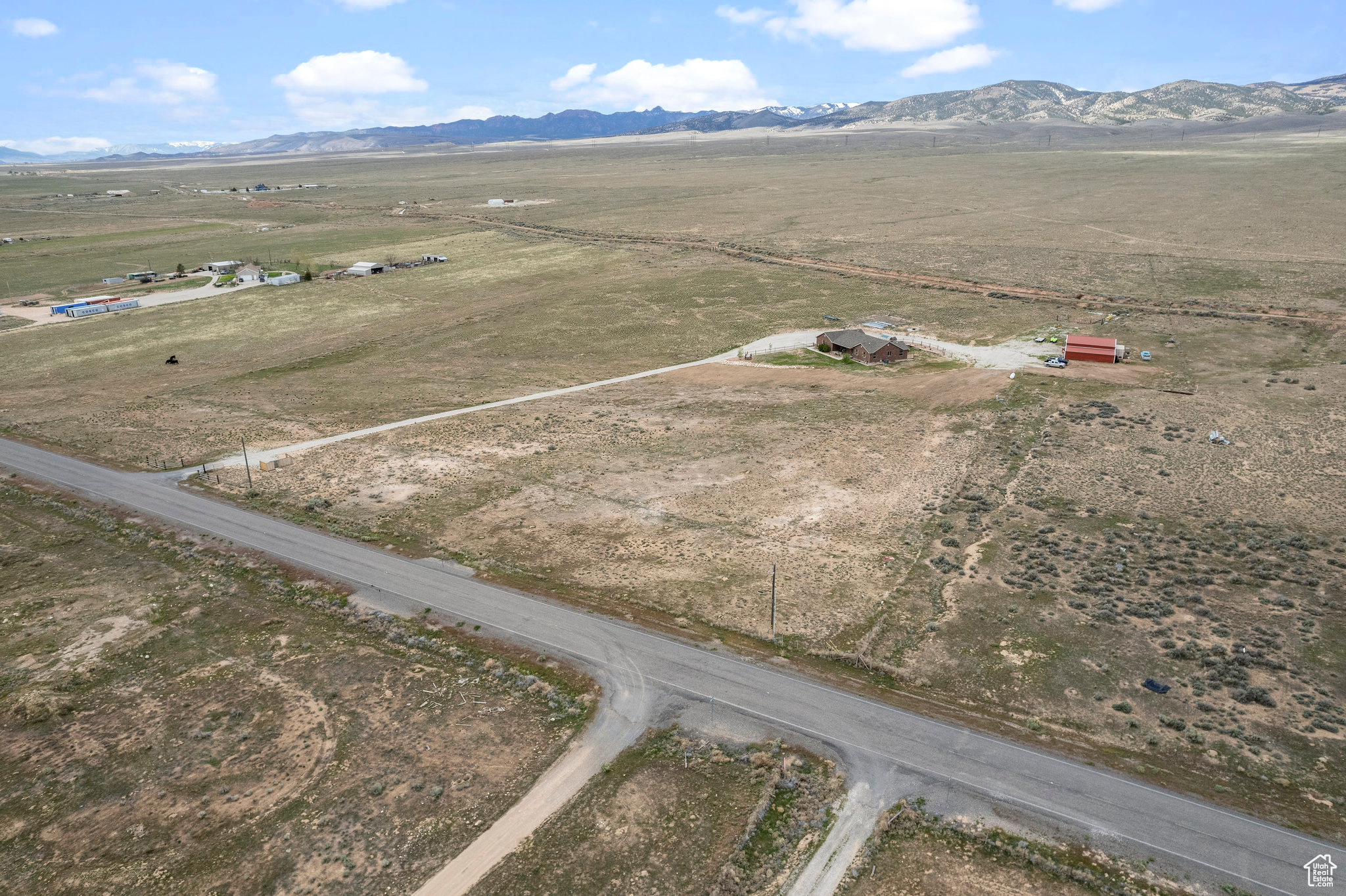 Drone / aerial view with a mountain view and a rural view