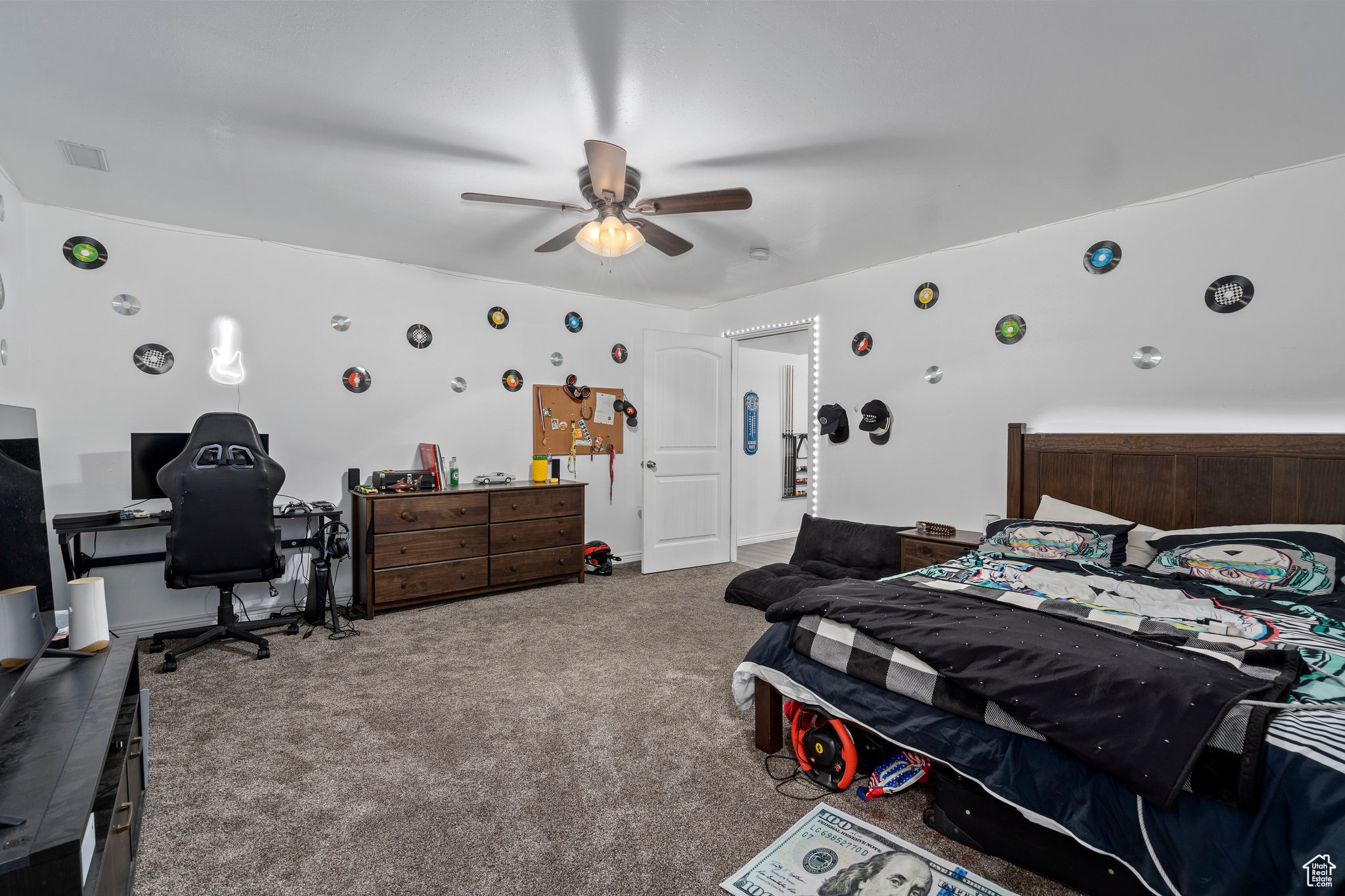 Bedroom with carpet and ceiling fan