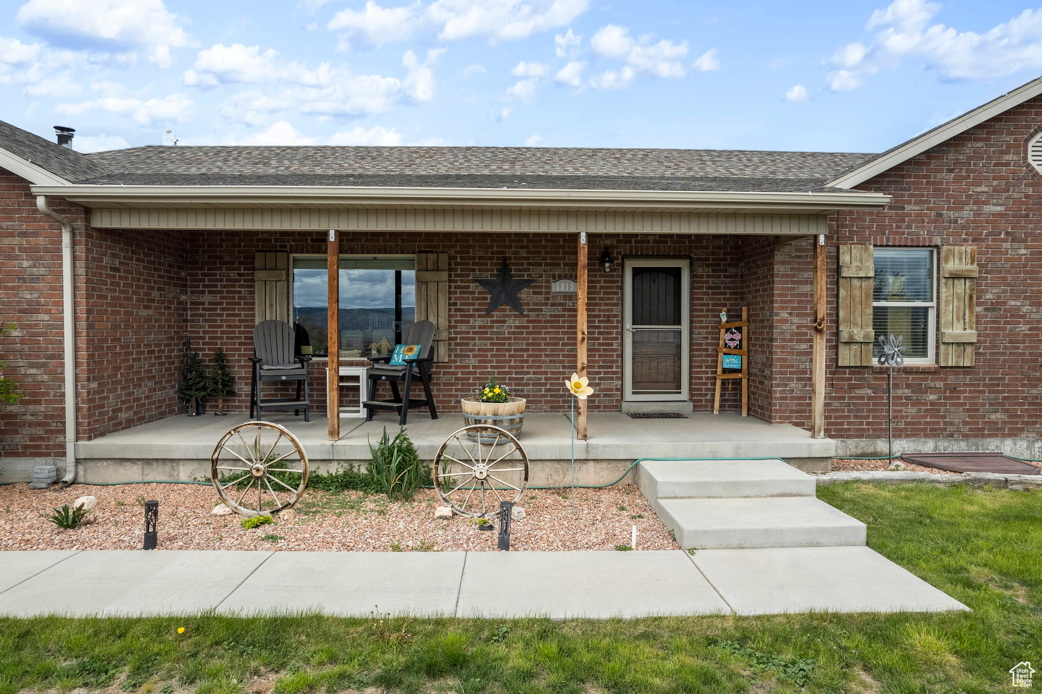 Property entrance featuring covered porch