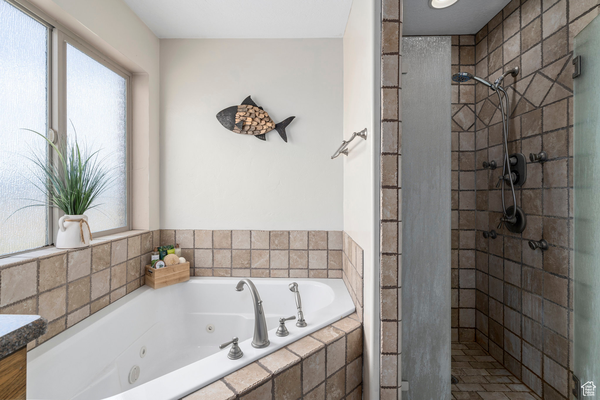 Bathroom with tiled shower