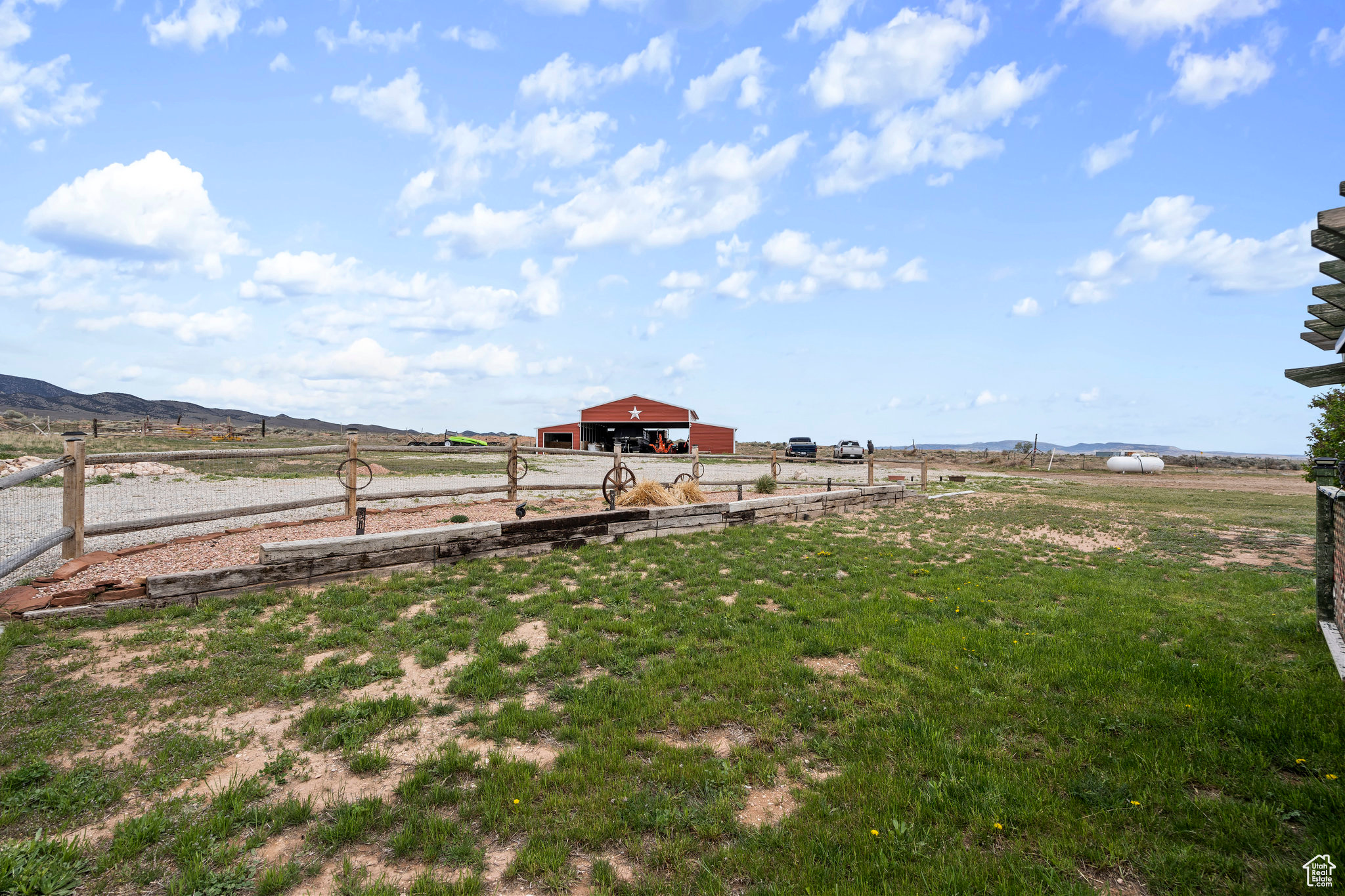 View of yard with a rural view