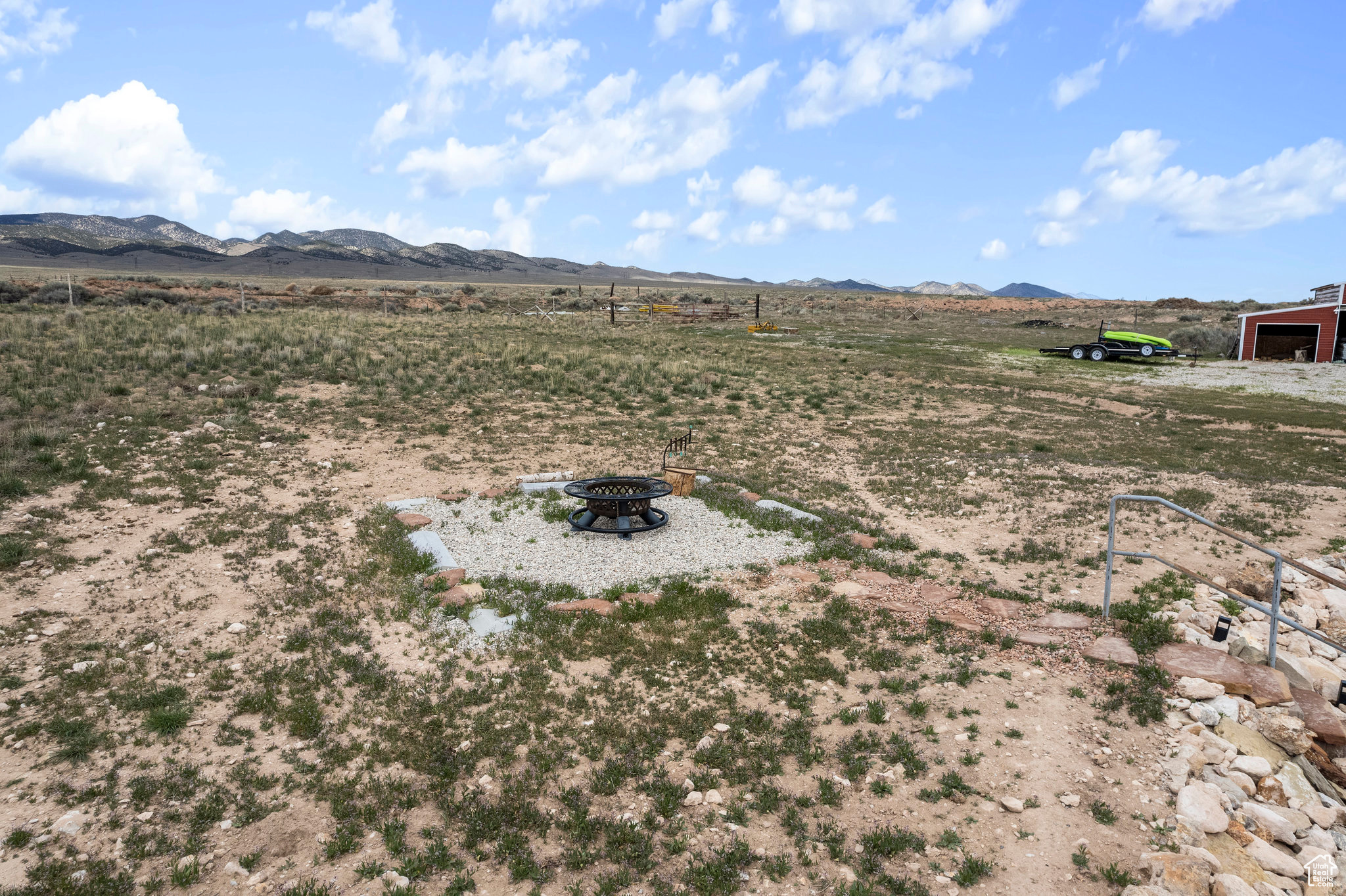 View of yard with a mountain view and a rural view