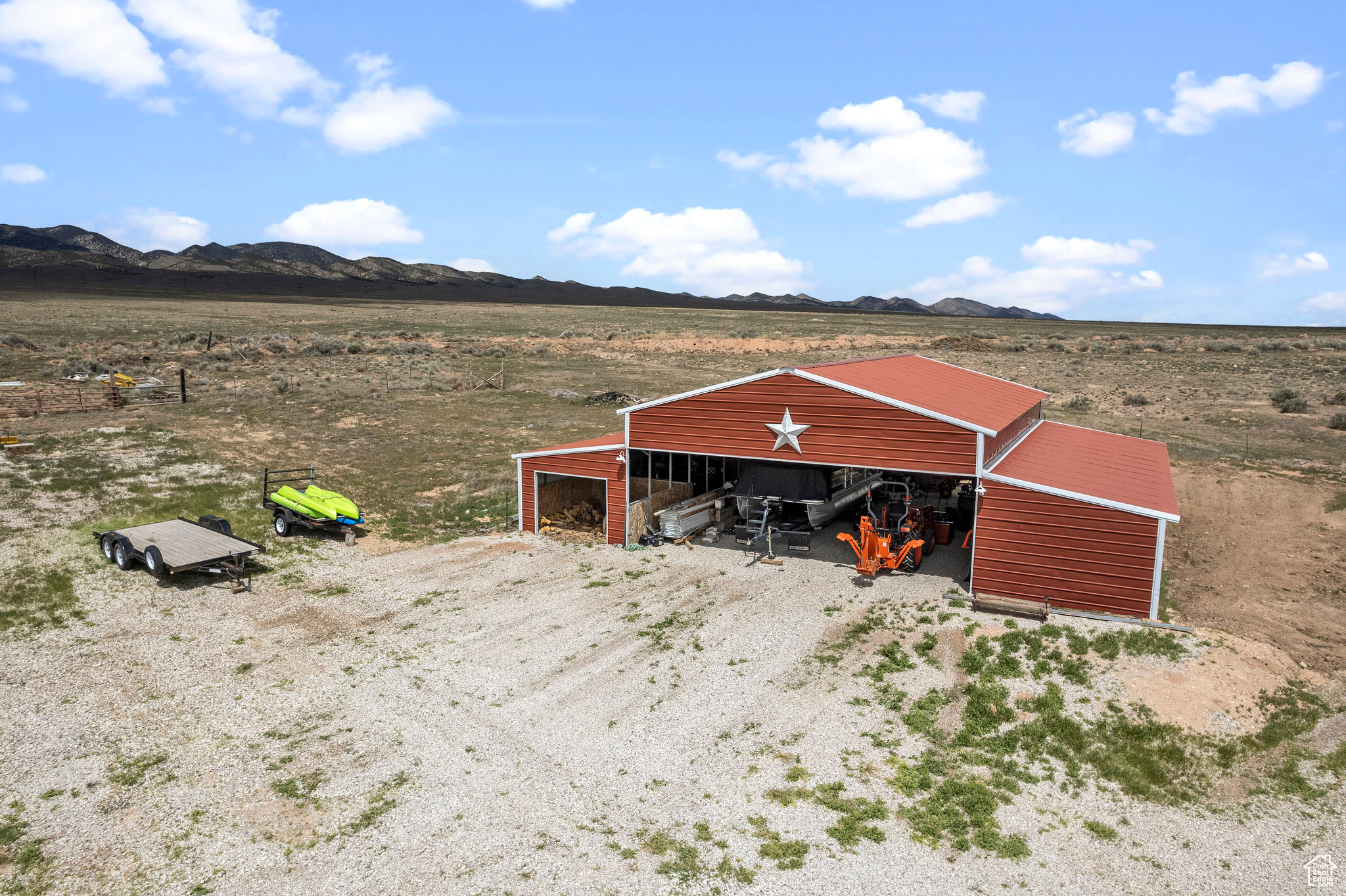 View of outdoor structure featuring a mountain view and a rural view