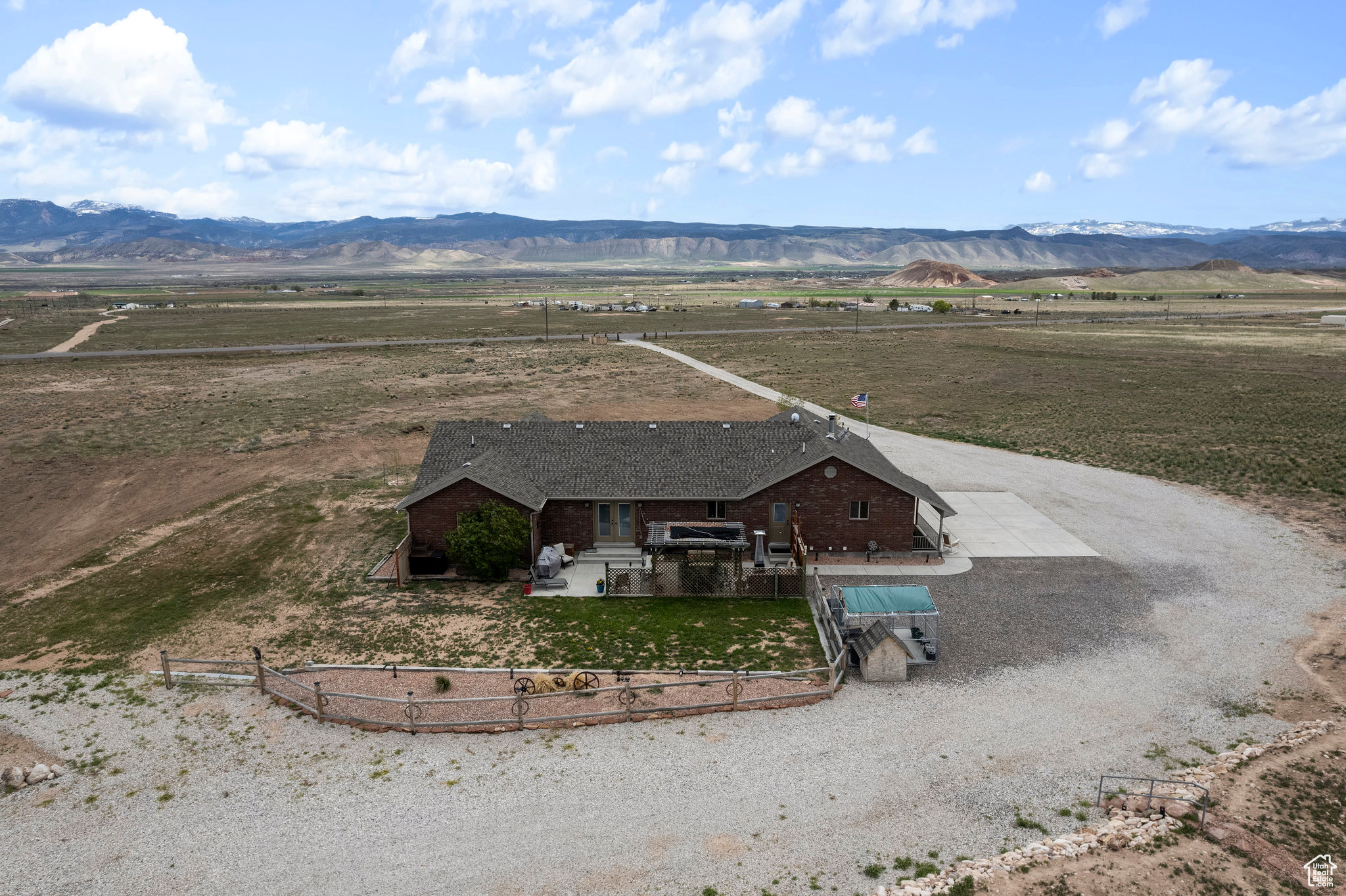 Drone / aerial view with a mountain view and a rural view