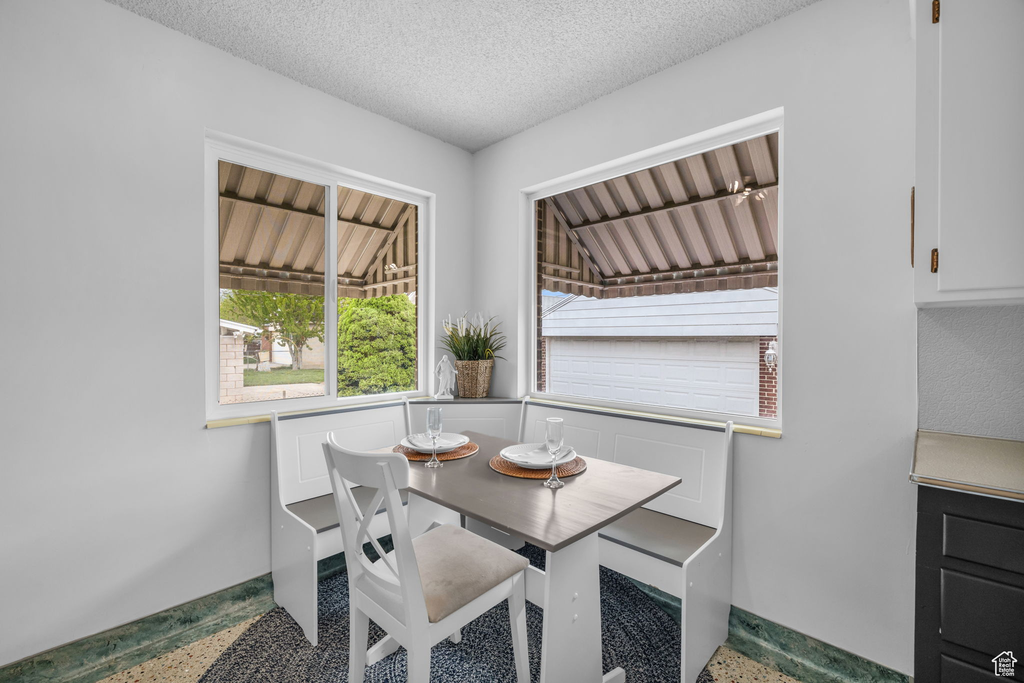 Dining space featuring a textured ceiling