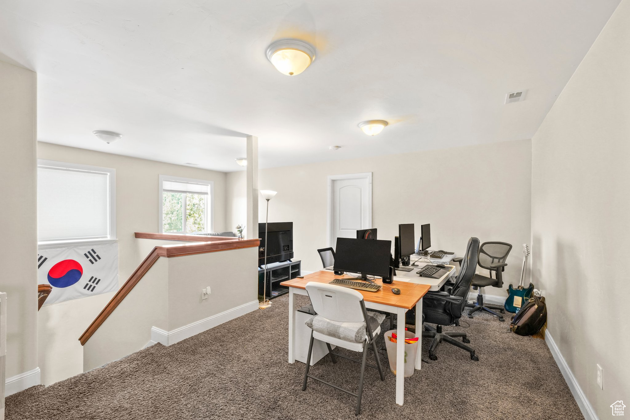 View of carpeted loft