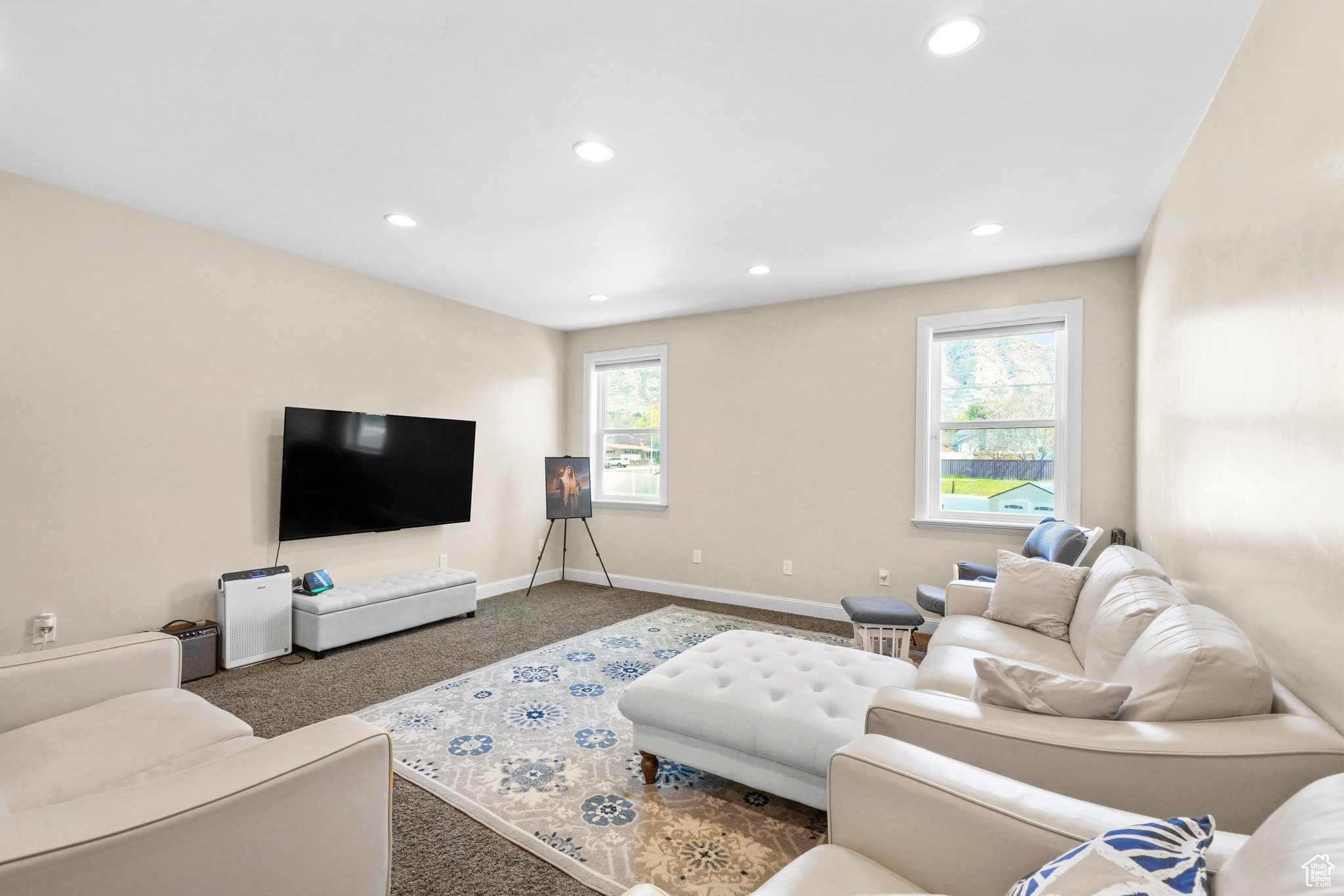 Living room featuring carpet floors