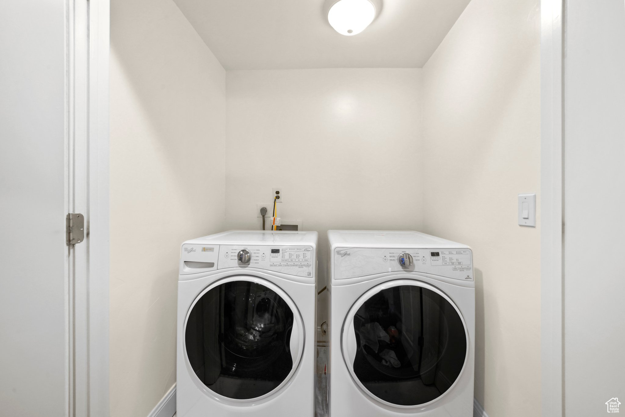 Clothes washing area with washer hookup and separate washer and dryer