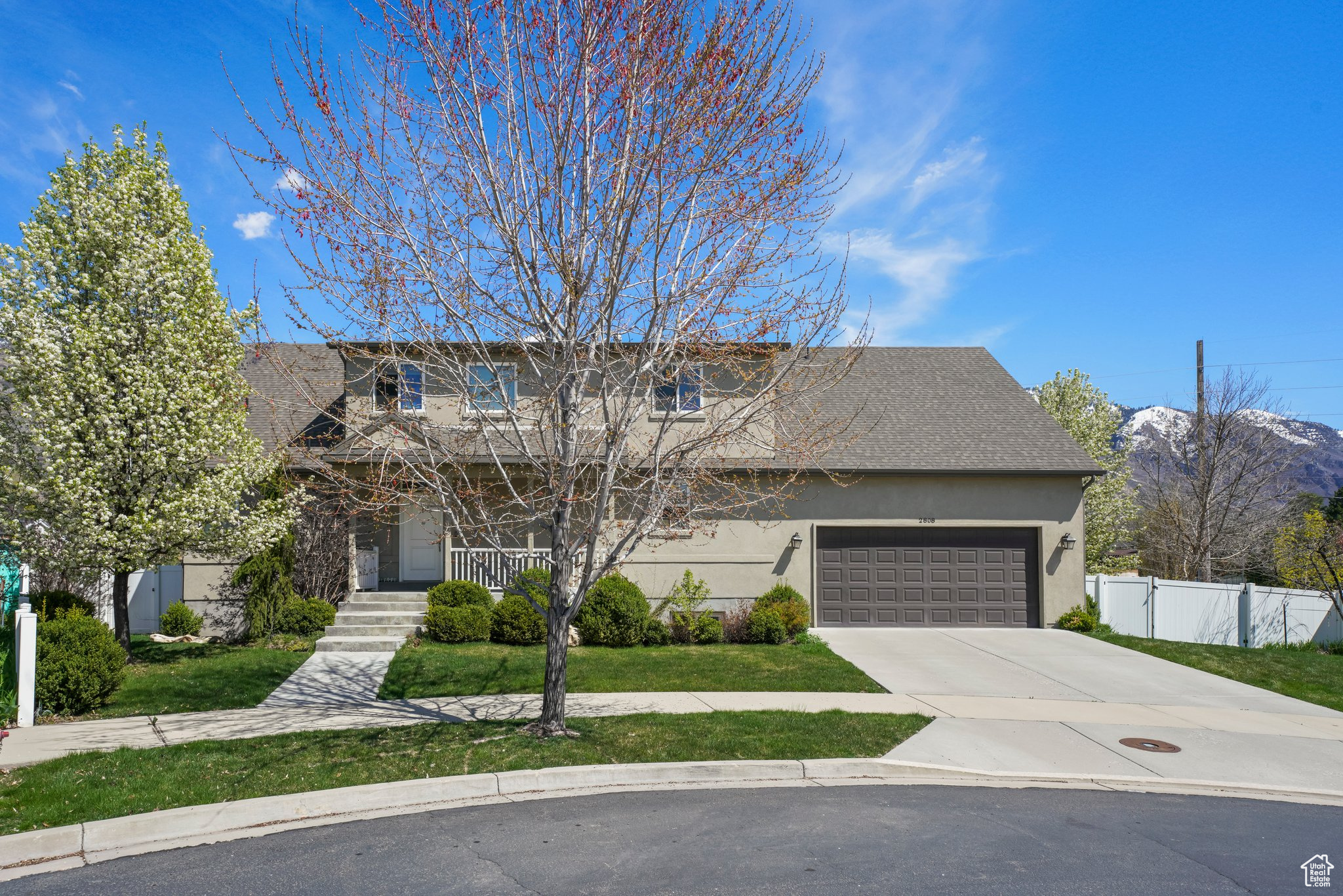 View of front of property with a front yard