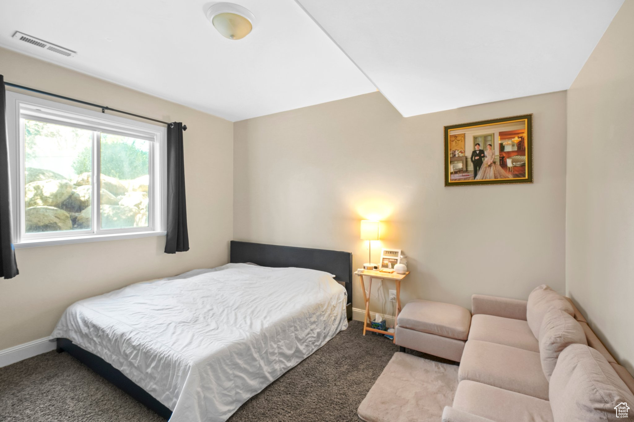 View of carpeted basement bedroom