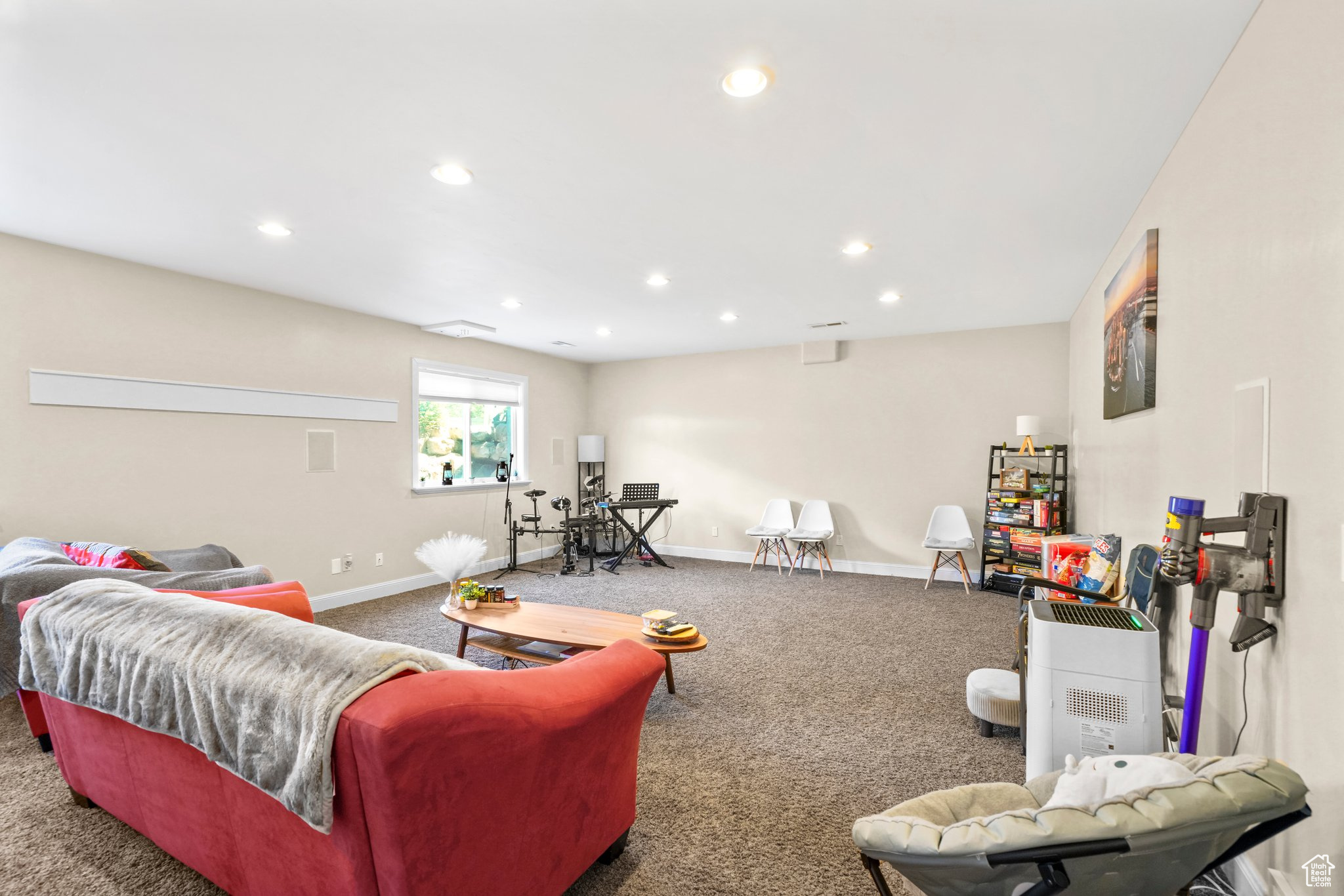 Basement Living room with carpet floors