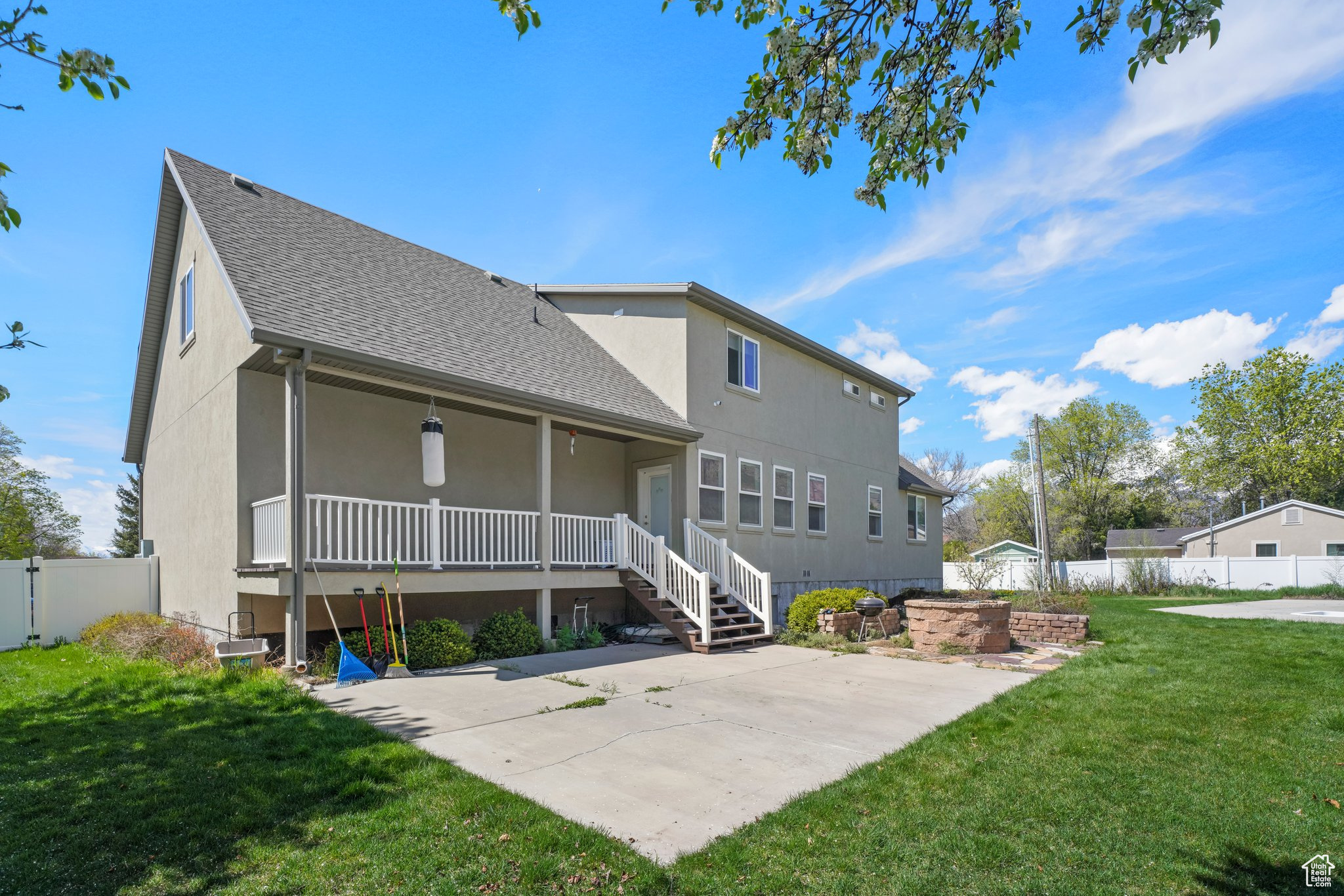 Rear view of property featuring a yard